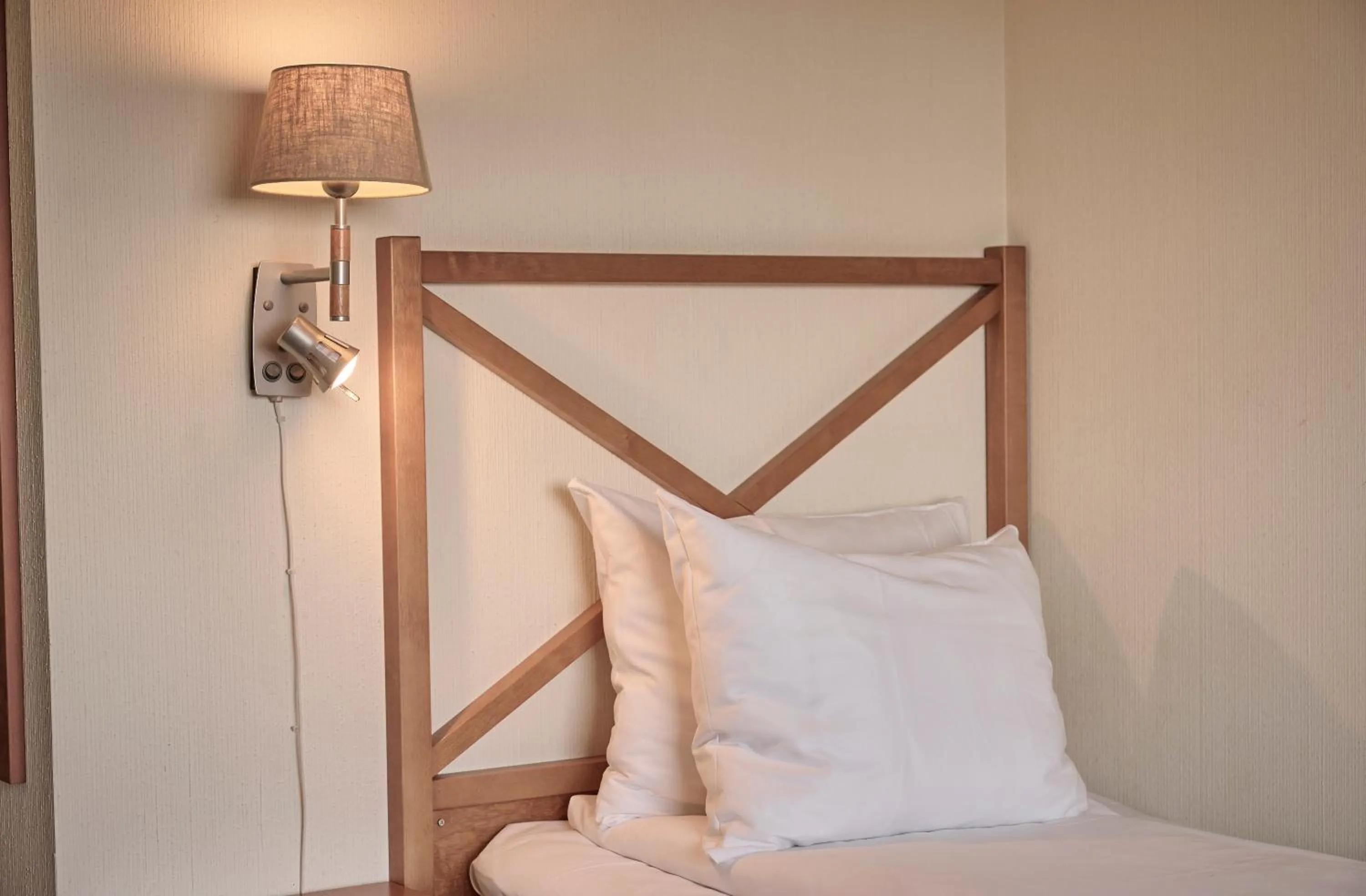 Bed in Sola Strand Hotel