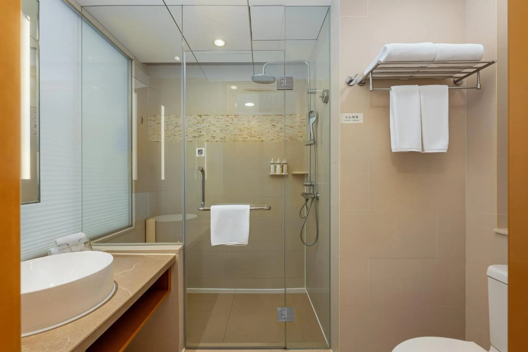 Bathroom in Holiday Inn Shanghai Pudong Kangqiao by IHG