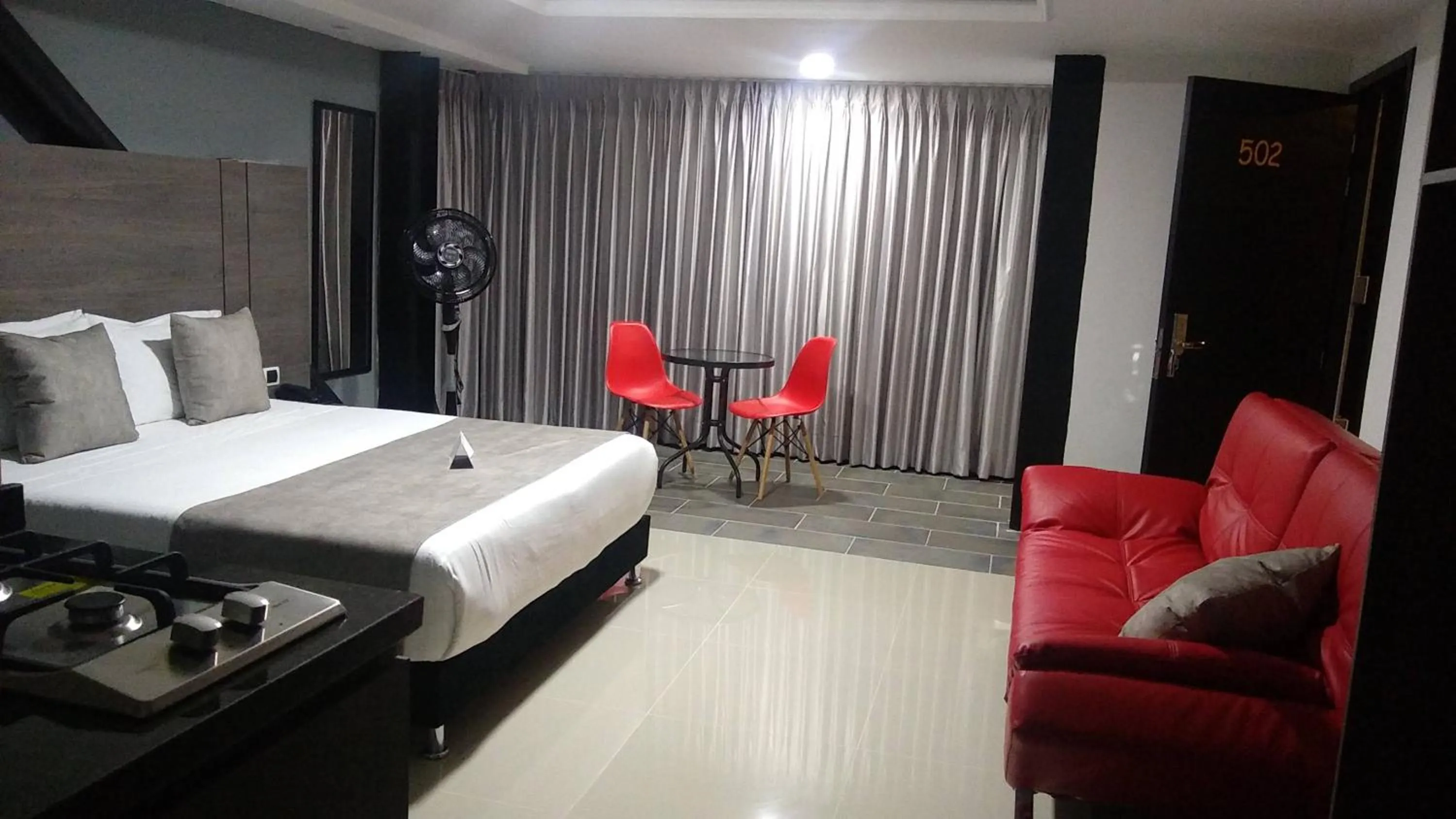 Seating area, Bed in HOTEl LA PORRA