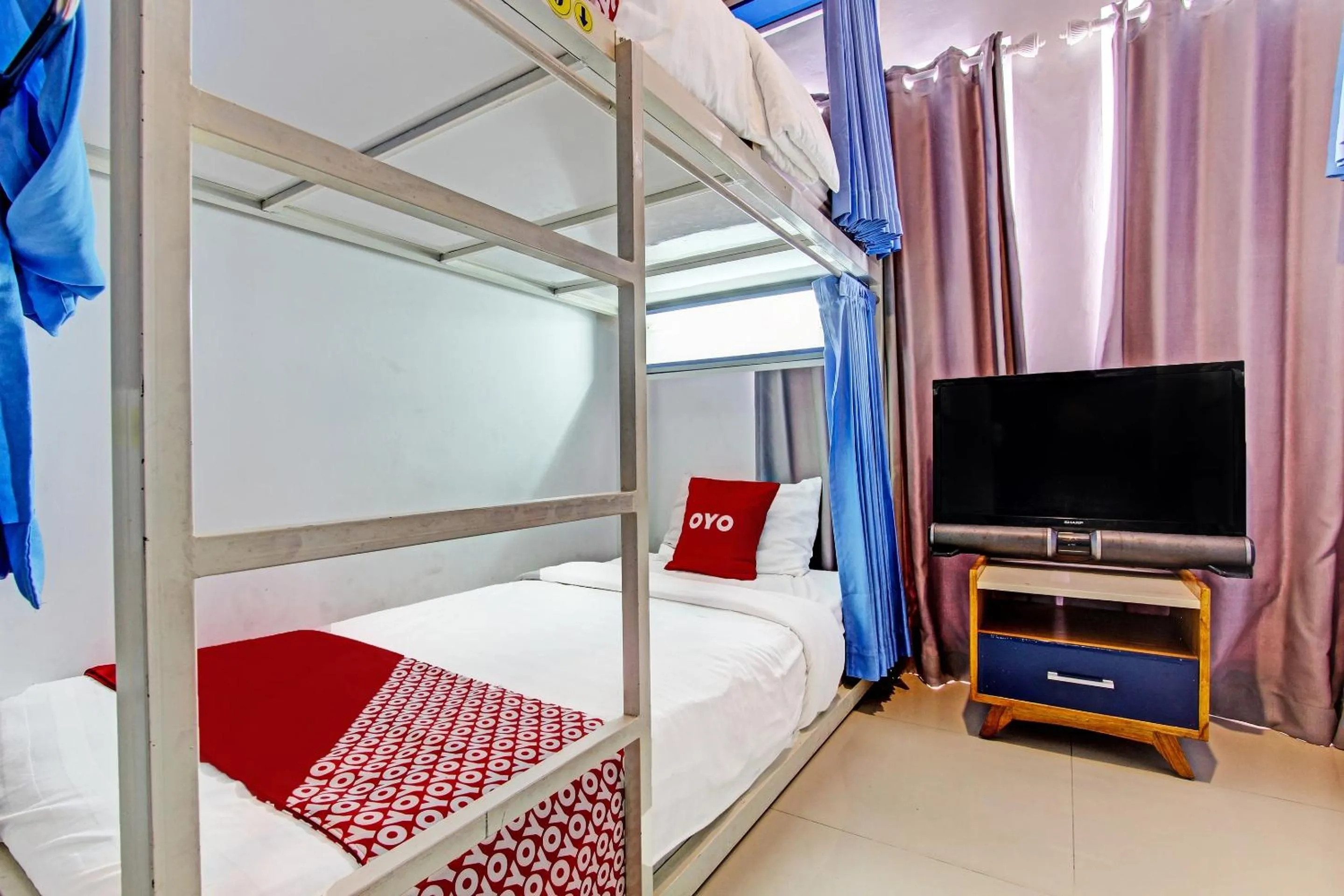 Bedroom in OYO 91952 Oase Hostel