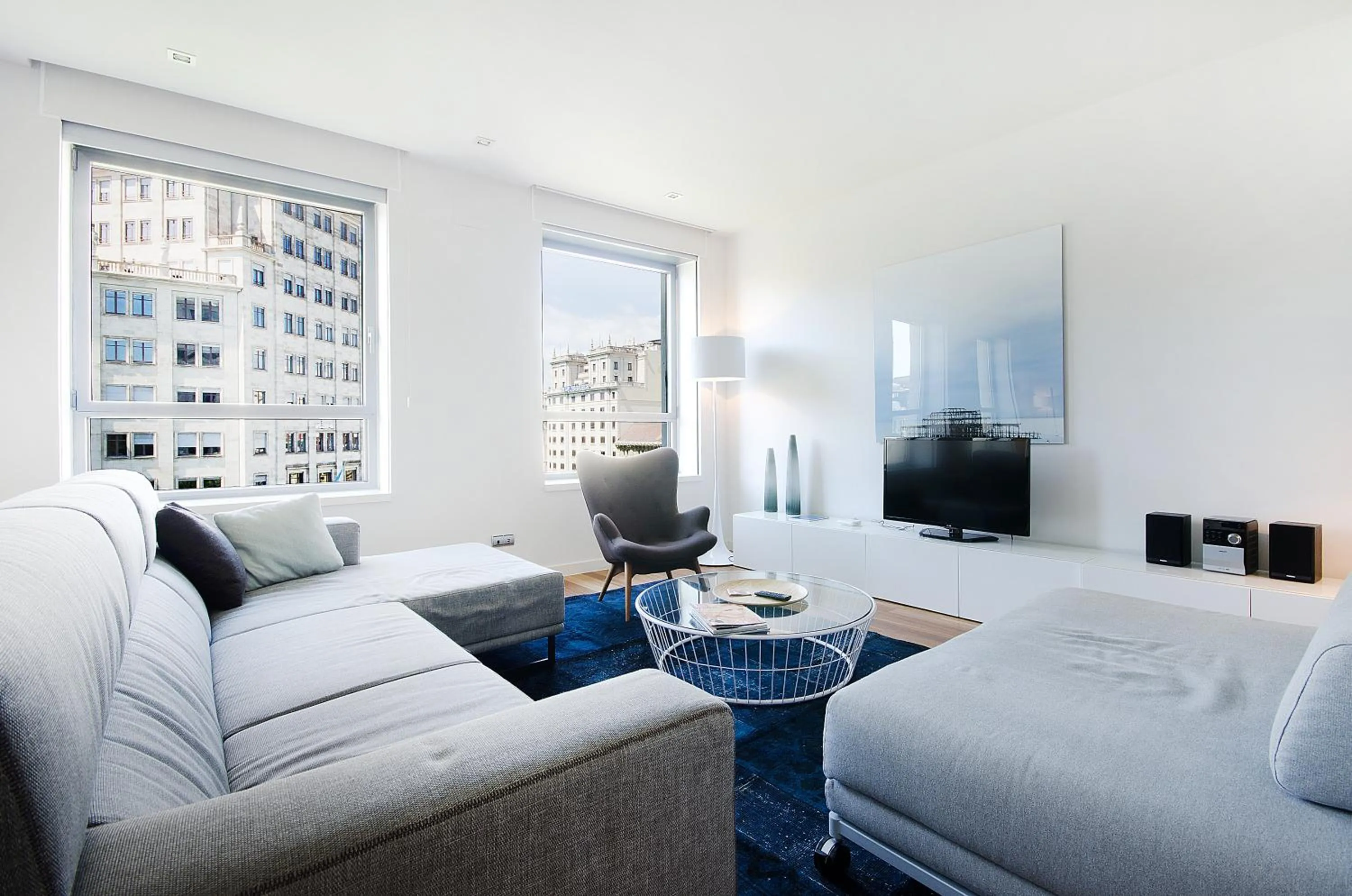 Living room, Bed in You Stylish City Center Apartments