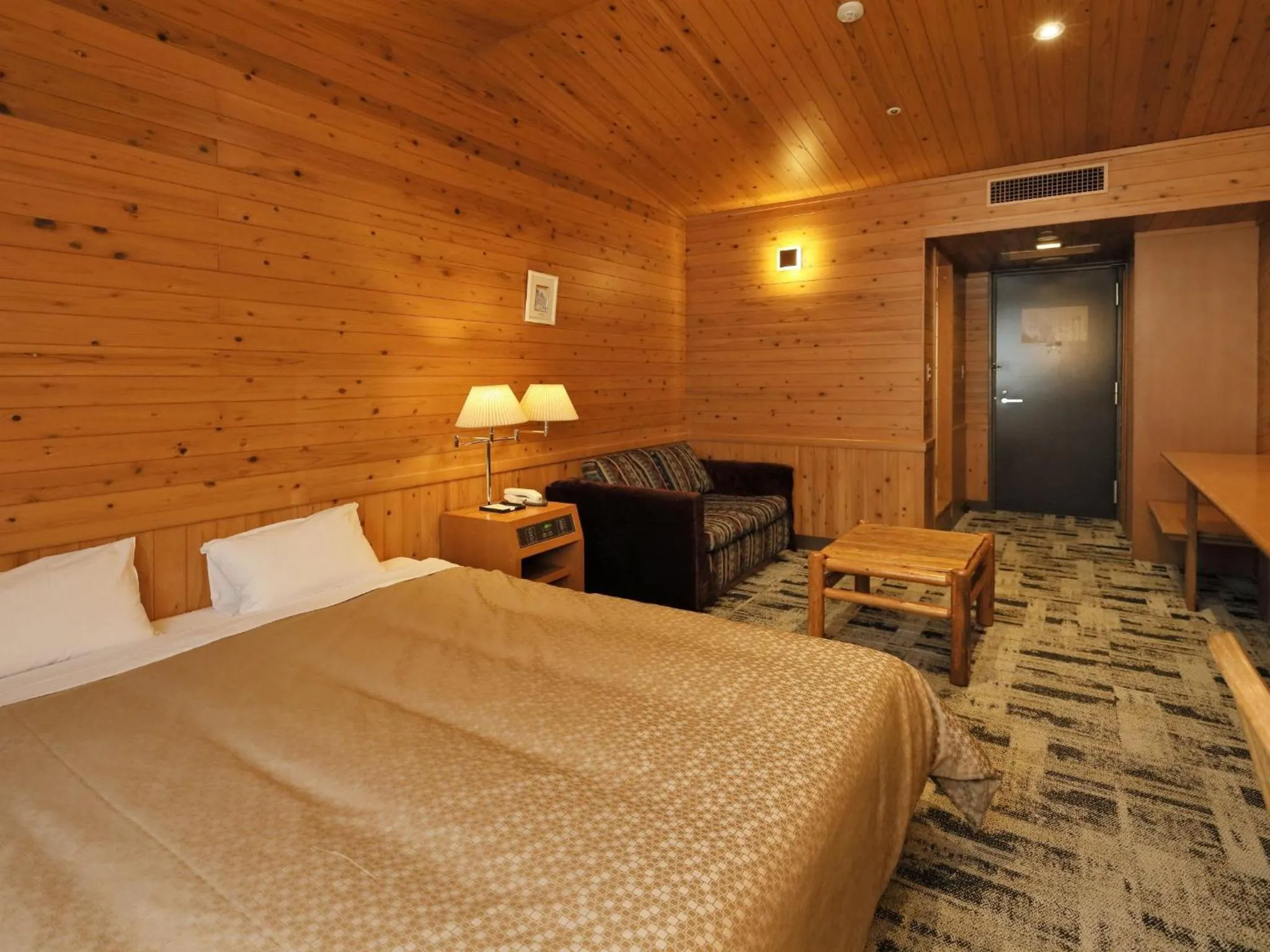 Photo of the whole room, Bed in Kibi Kogen Resort Hotel