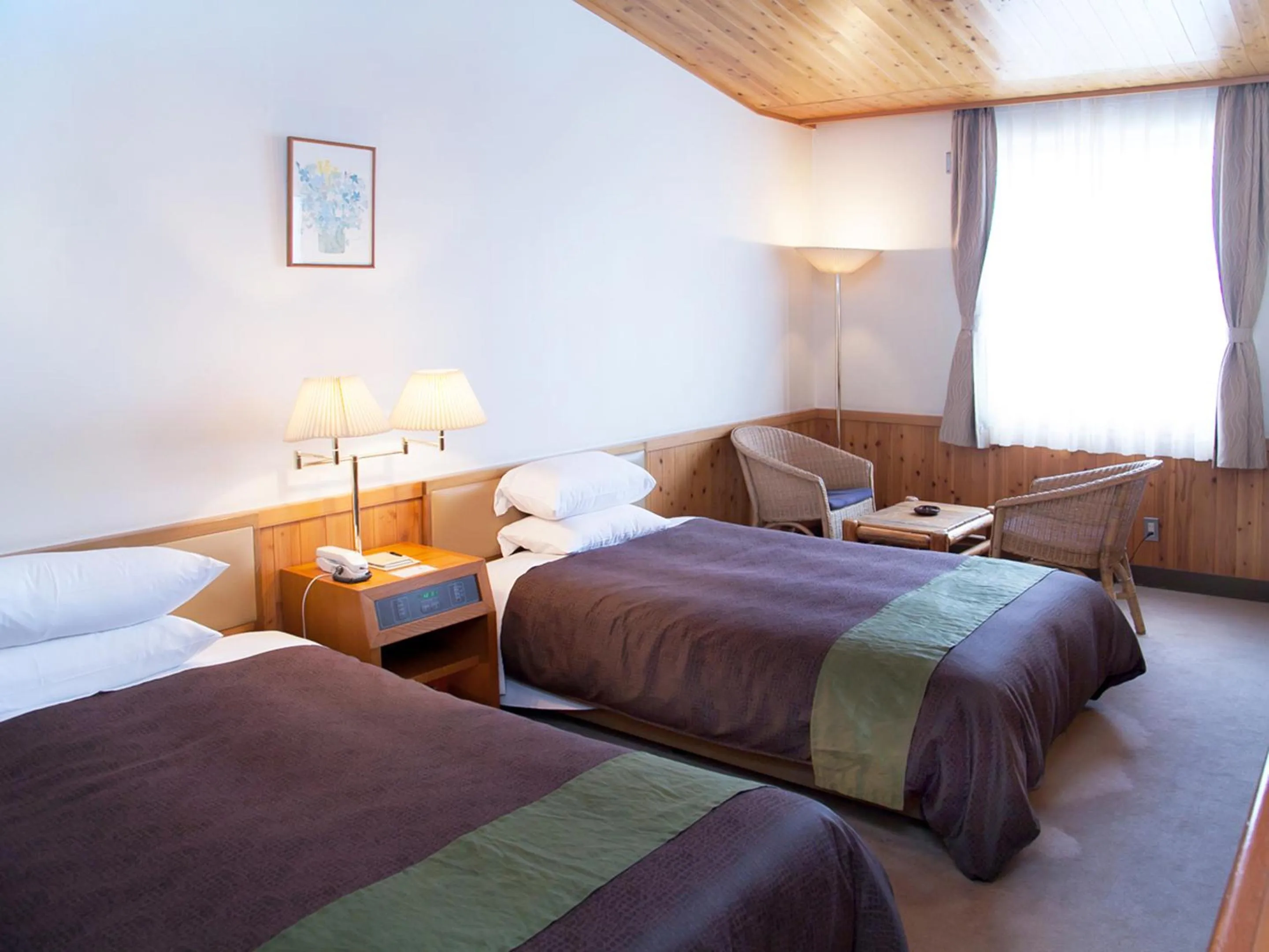 Photo of the whole room, Bed in Kibi Kogen Resort Hotel