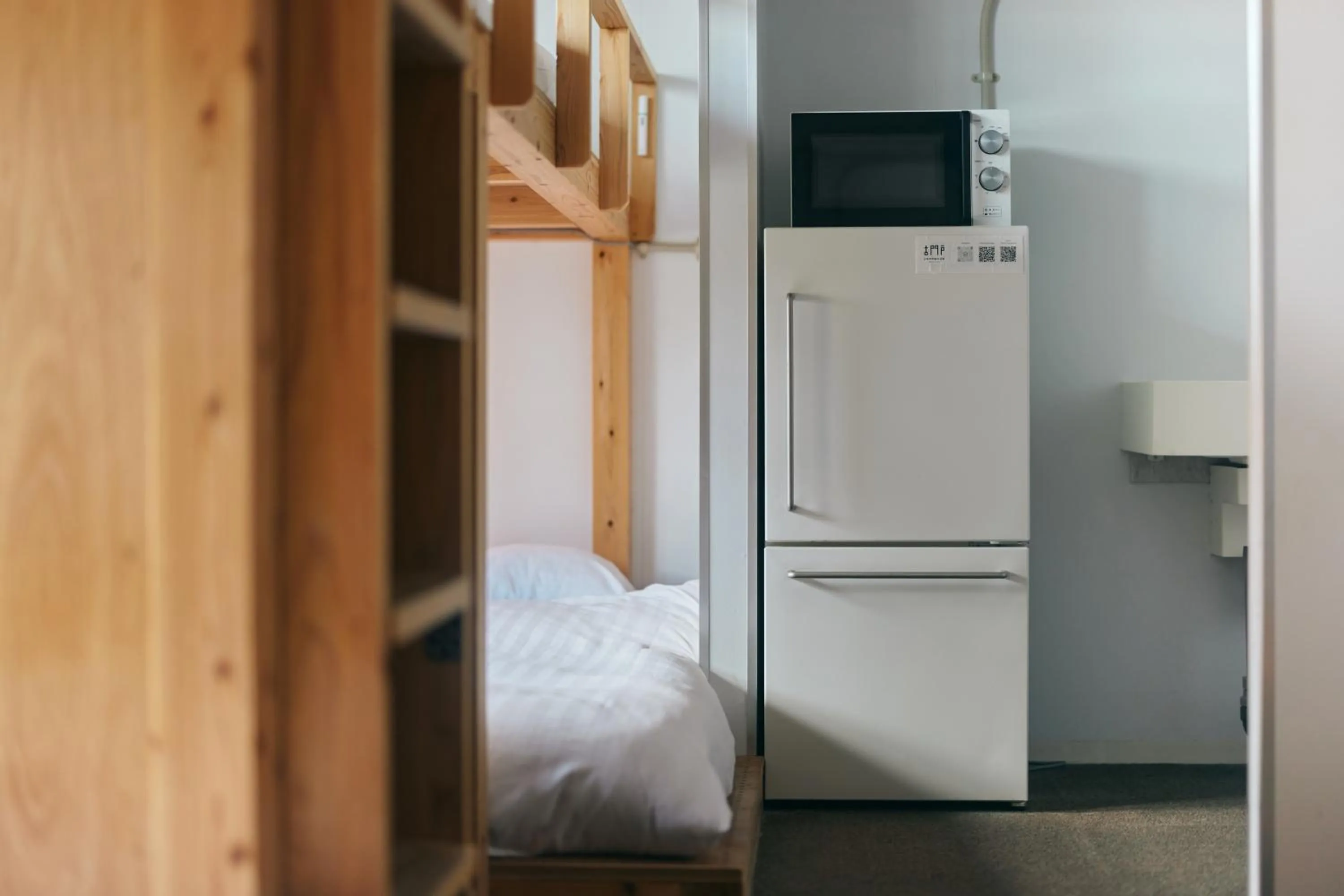 Kitchen or kitchenette in Common de - Hostel & Bar