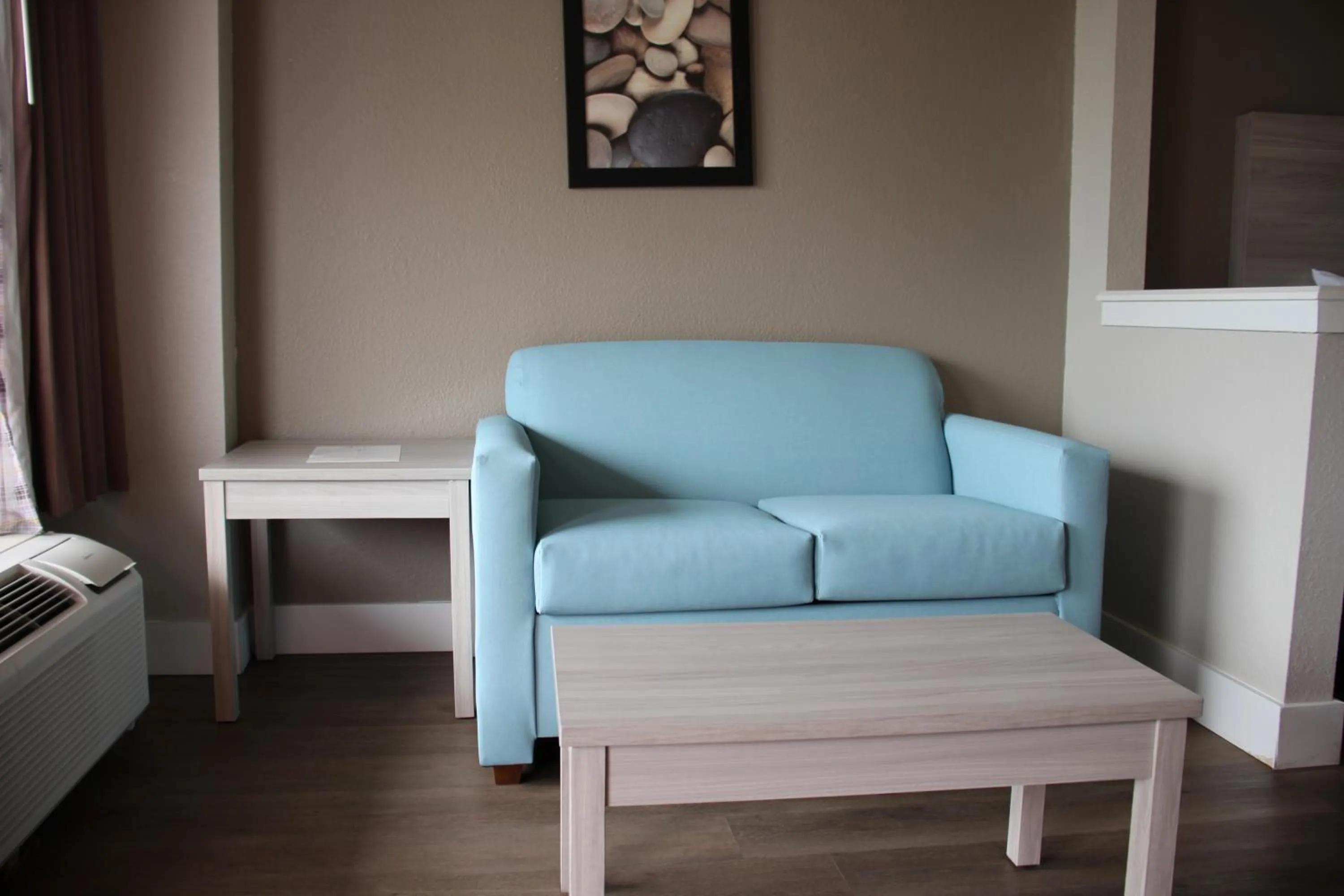 Bedroom in Boca Suites Deerfield Beach; SureStay Collection by BW