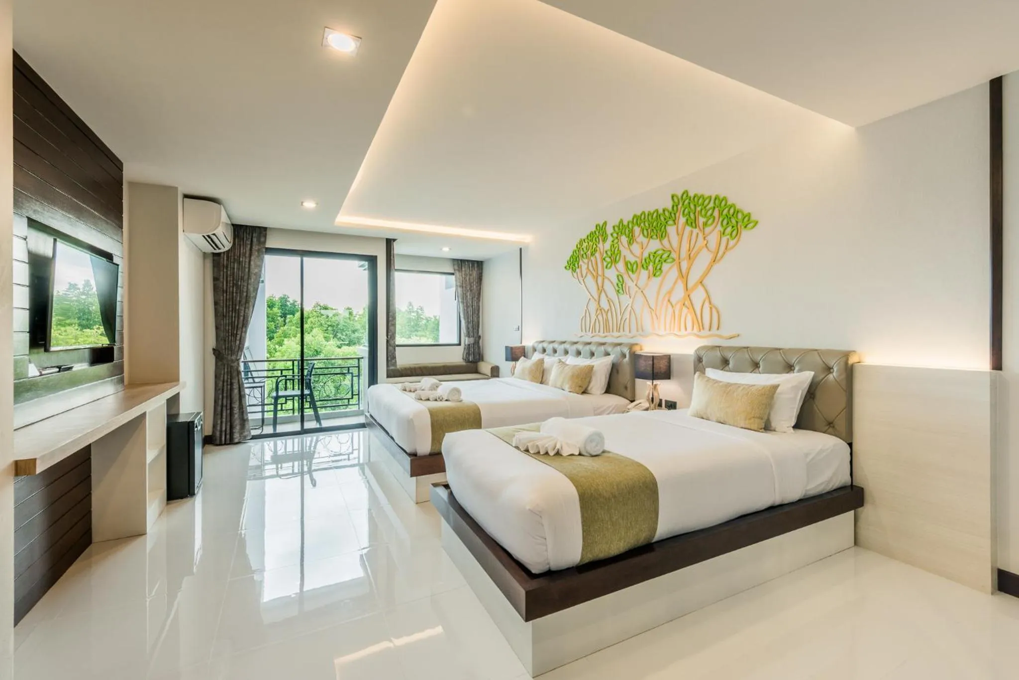 Bed in River Front Krabi Hotel