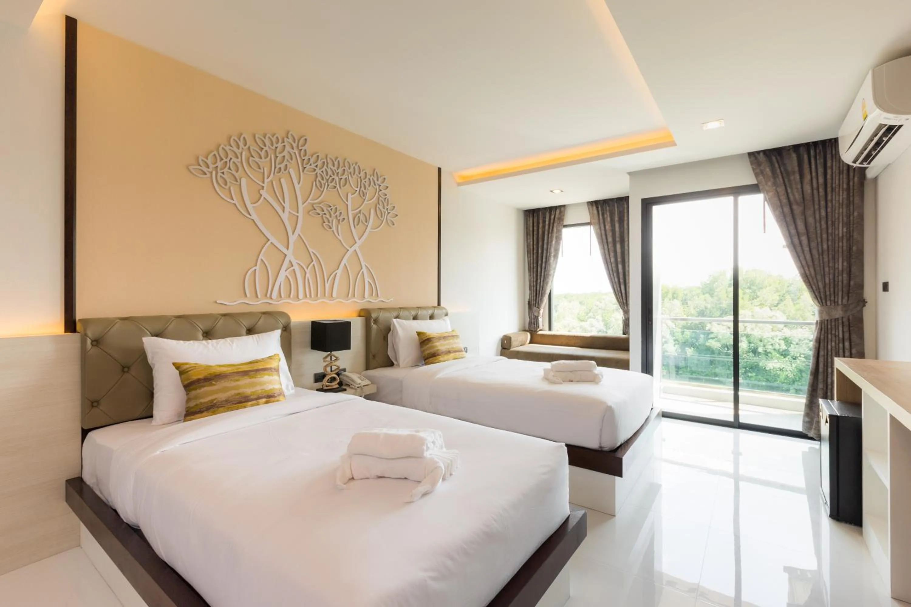 Bed in River Front Krabi Hotel