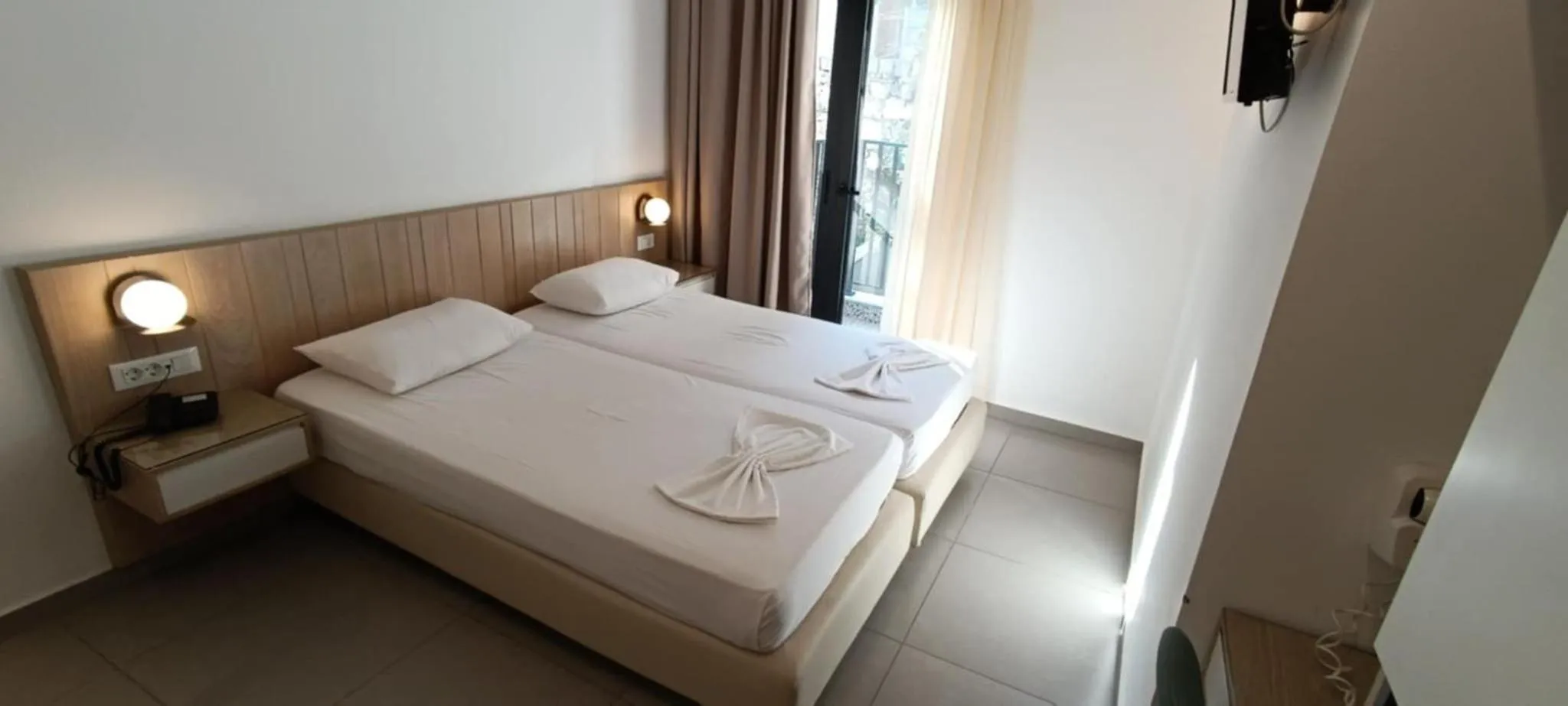 Bed in Catherine Hotel