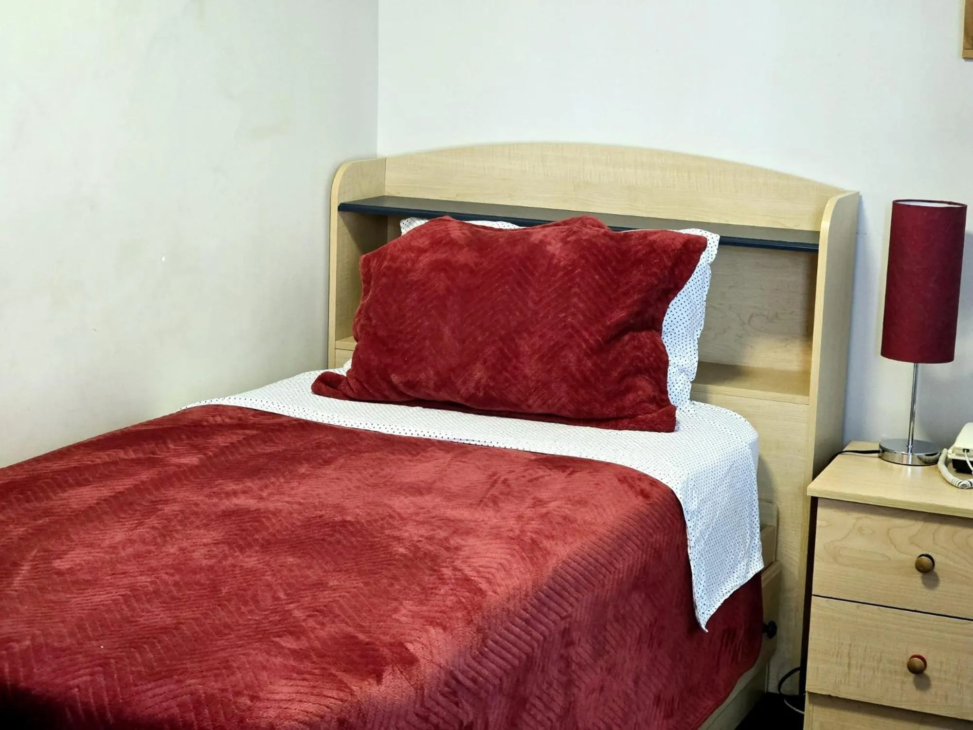 Bed in Motel LA RÉFÉRENCE