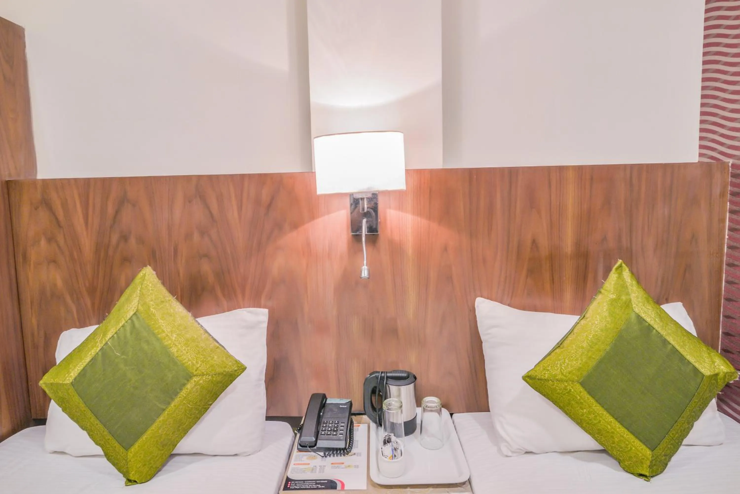 Living room, Bed in Oxford Hotel Powai