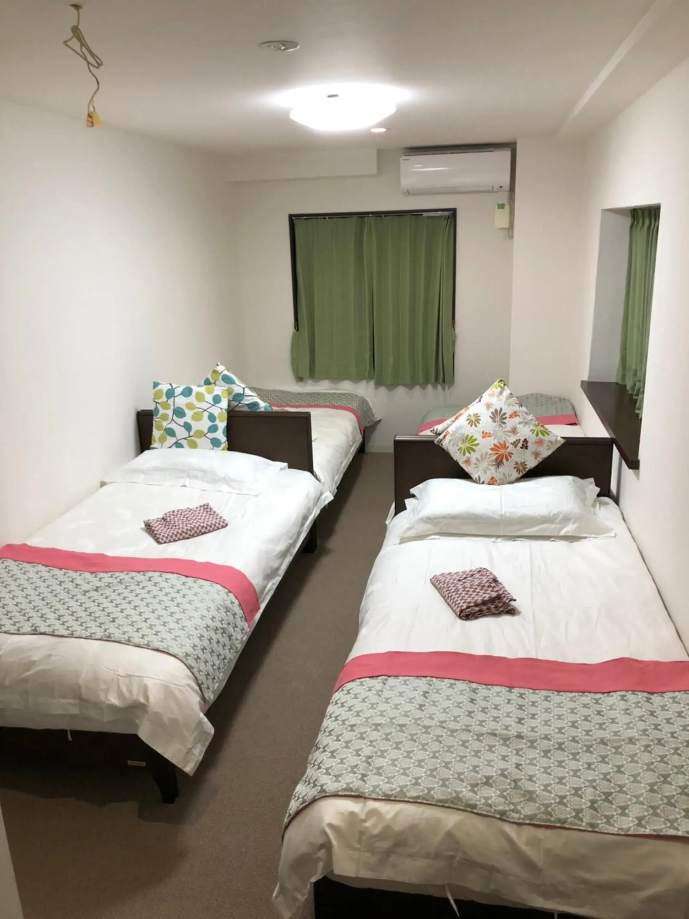 Quadruple Room with Private Bathroom in GreenHotel Quadruple Room with Private Bathroom in GreenHotel