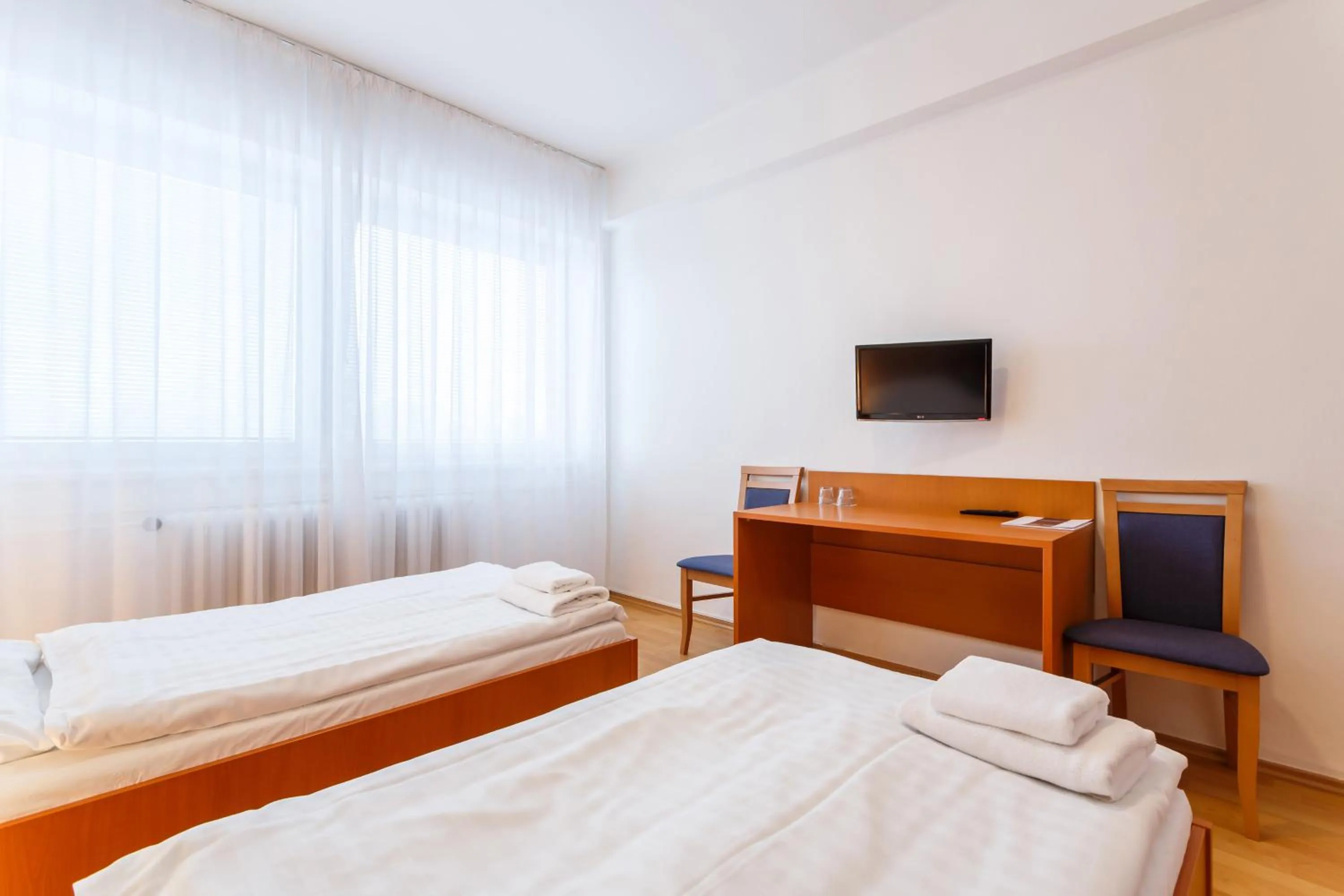 Bed in Hotel Veronika