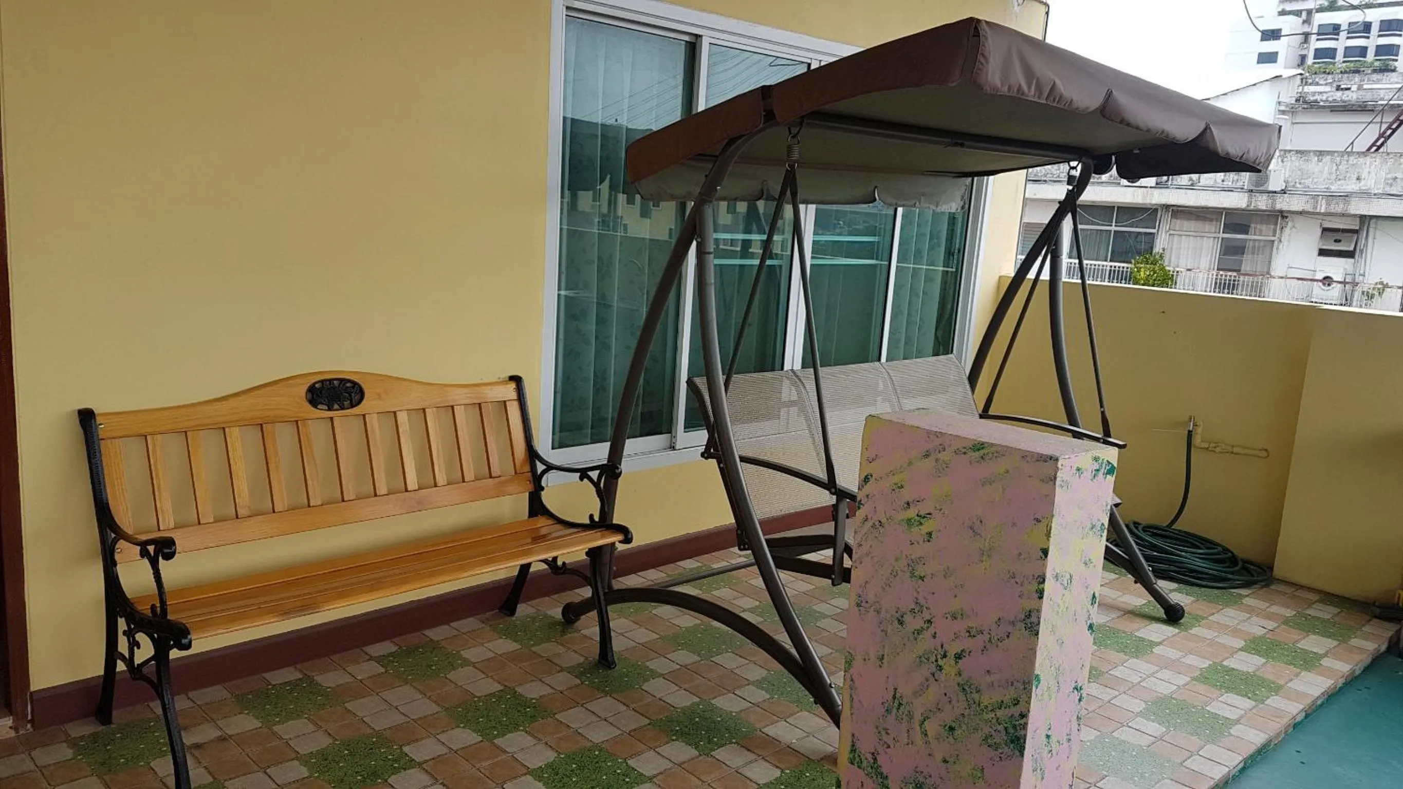 Seating area in Samsen Sam Place