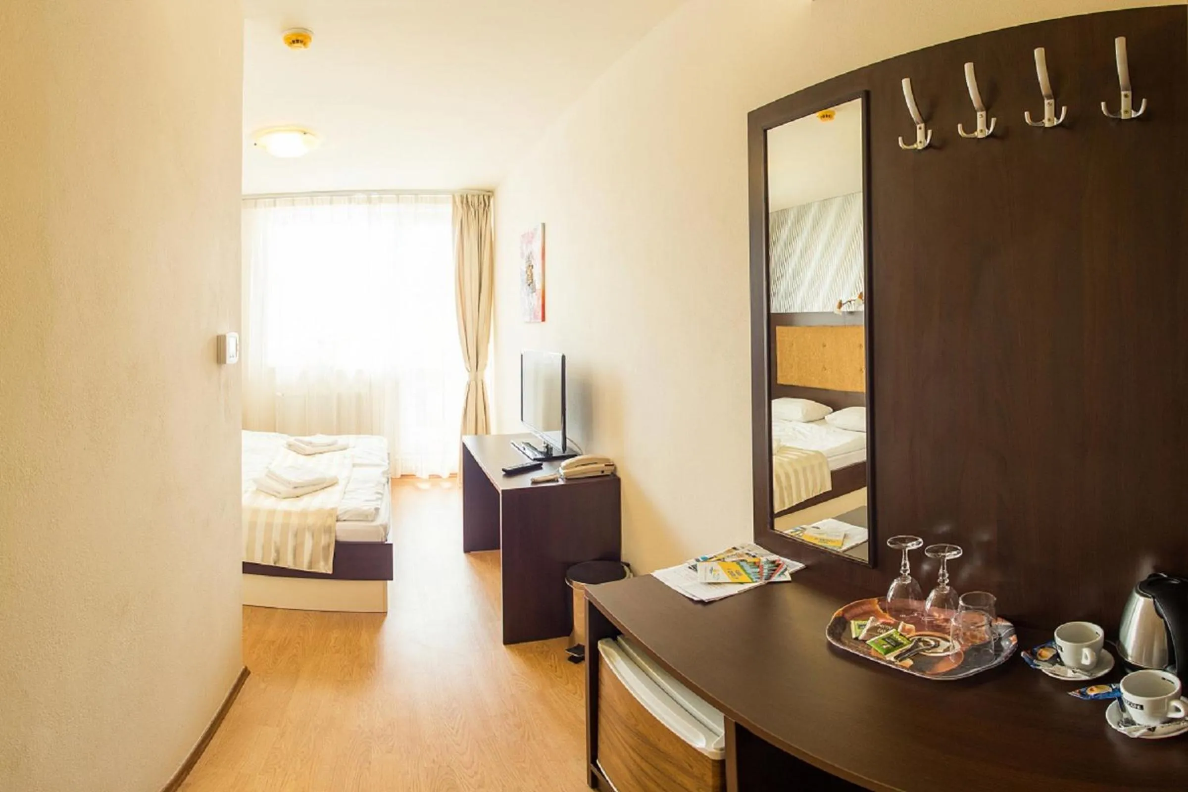 Photo of the whole room, Bed in Hotel Sun