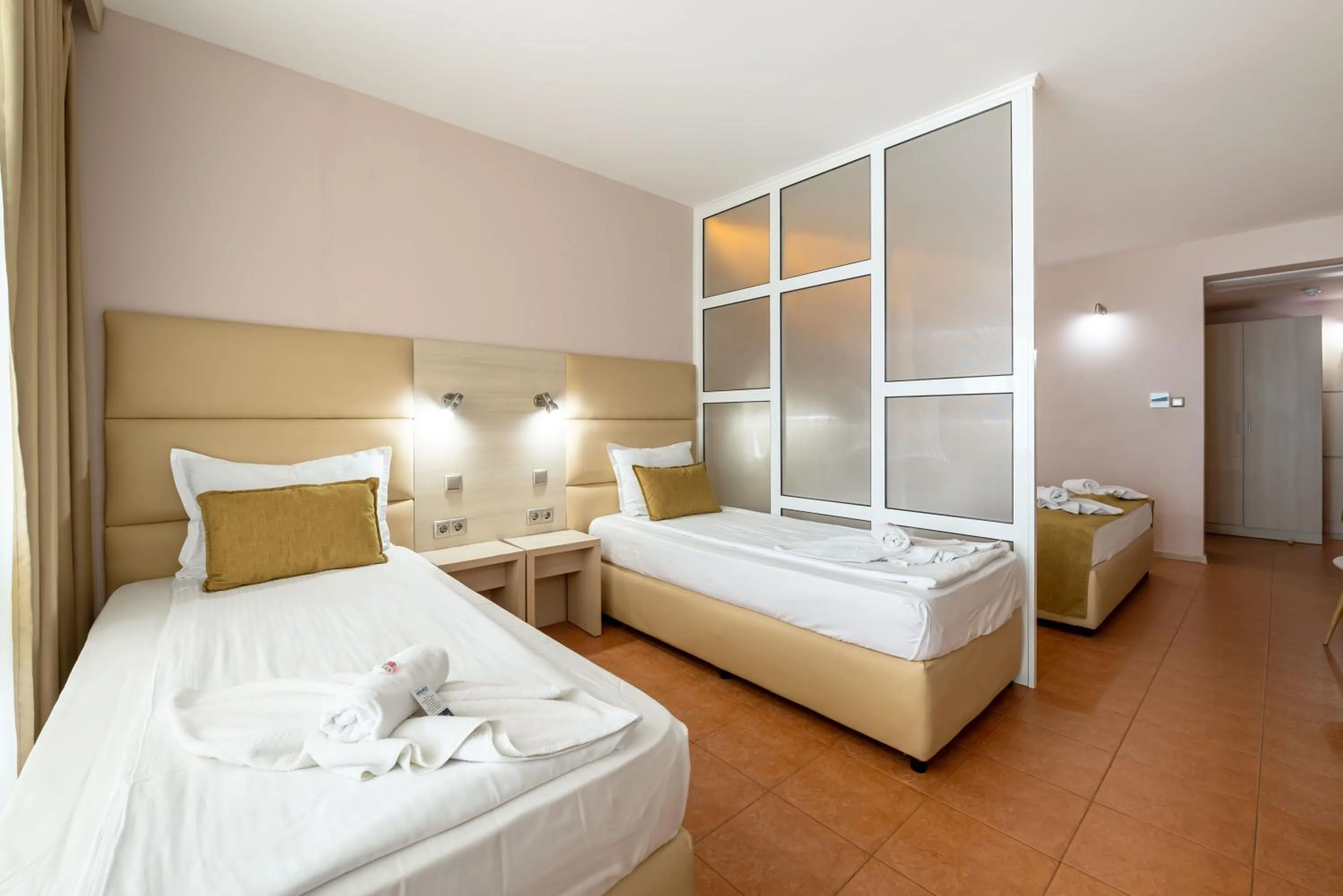 Bed in Aphrodite Beach Hotel