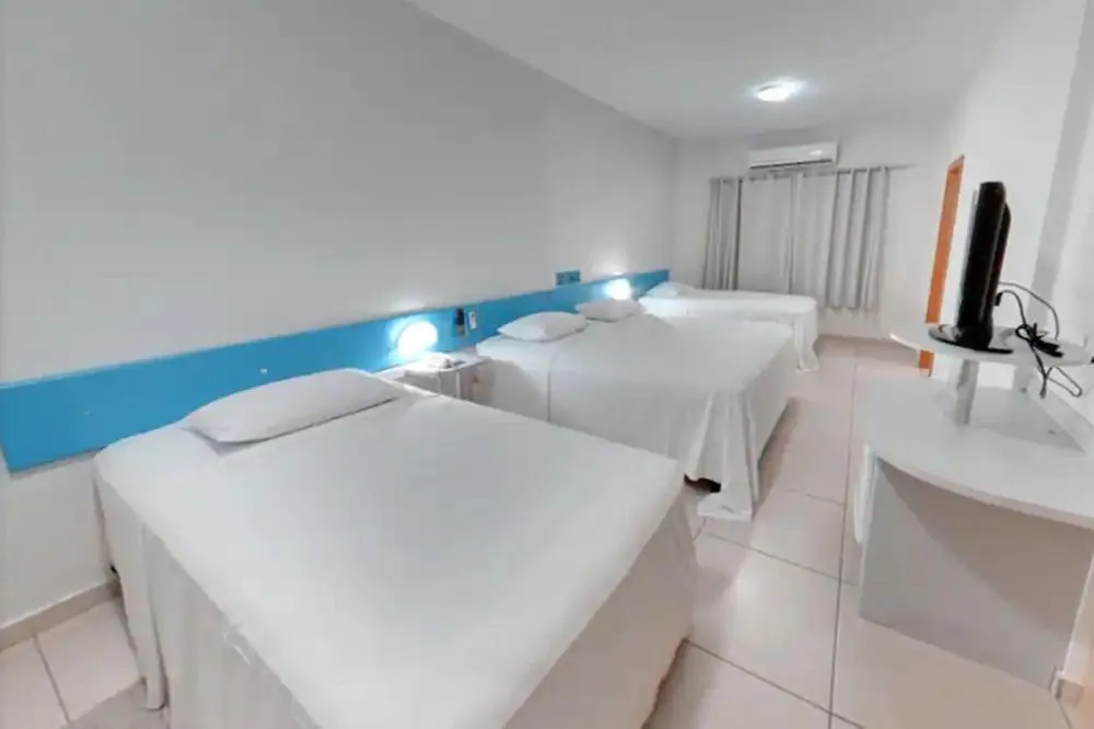 Bed in Amazon Plaza Hotel