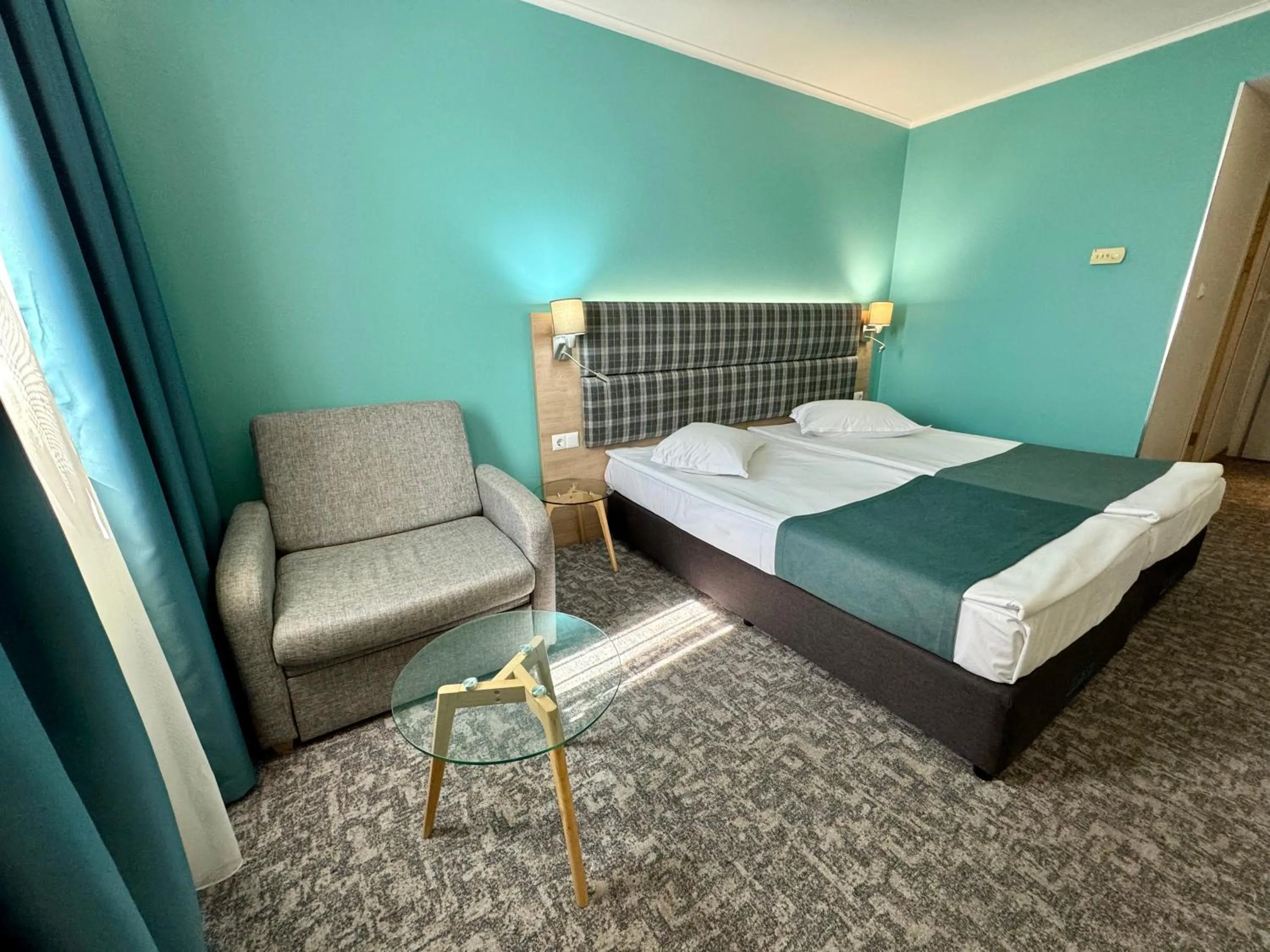 Photo of the whole room, Bed in Aqua Hotel