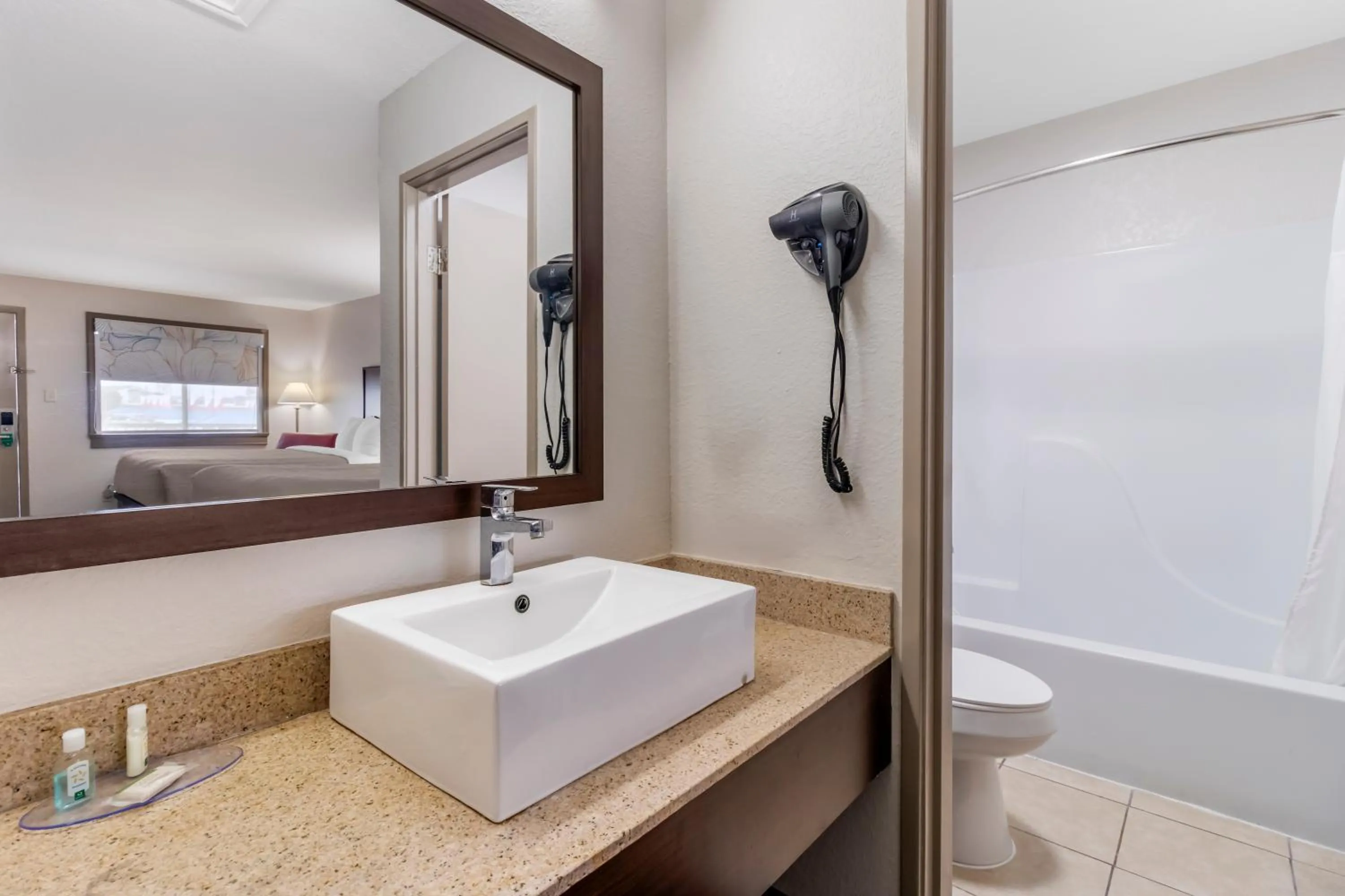 Shower in Quality Inn & Suites I-10 near Fiesta Texas