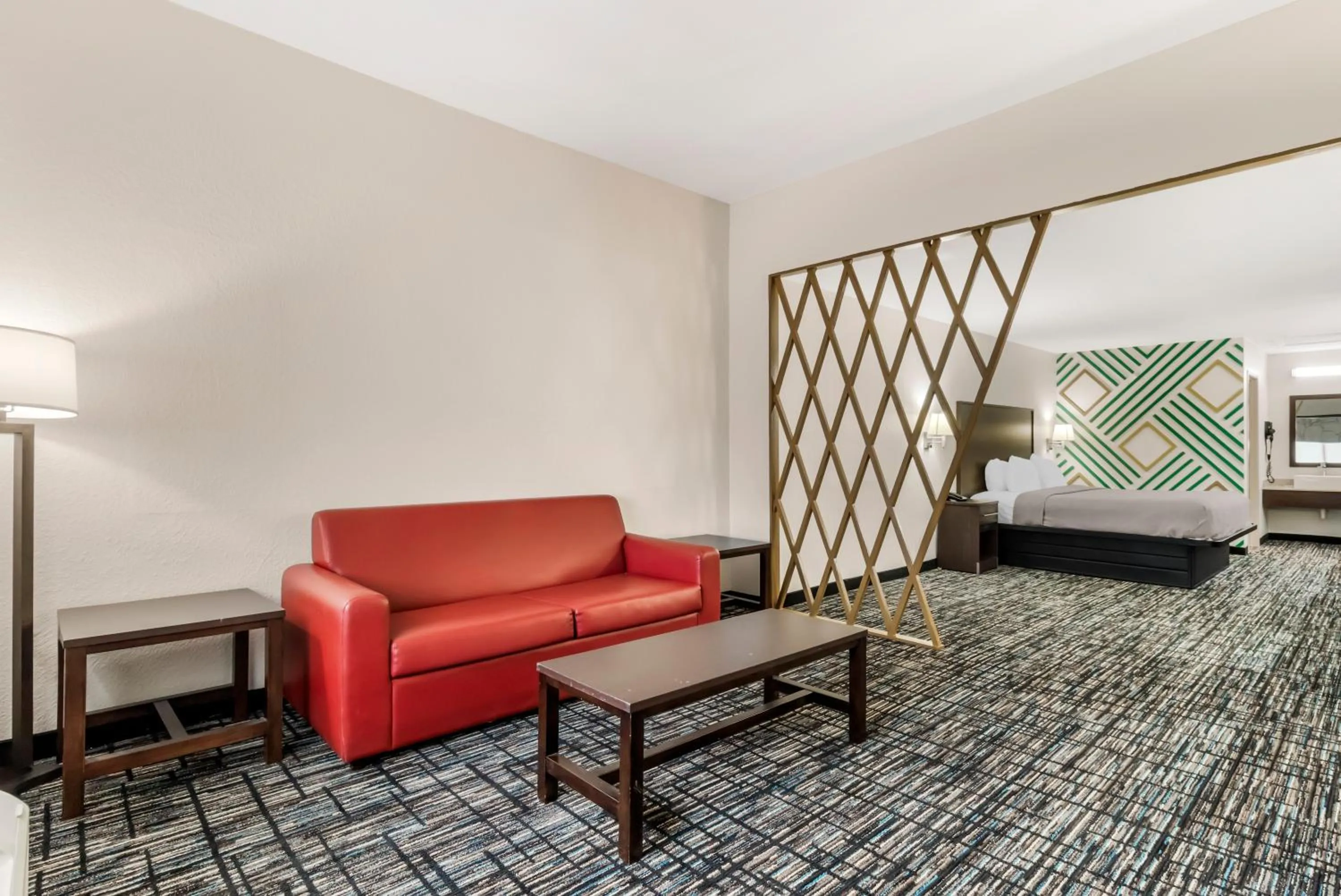 Seating area, Bed in Quality Inn & Suites I-10 near Fiesta Texas