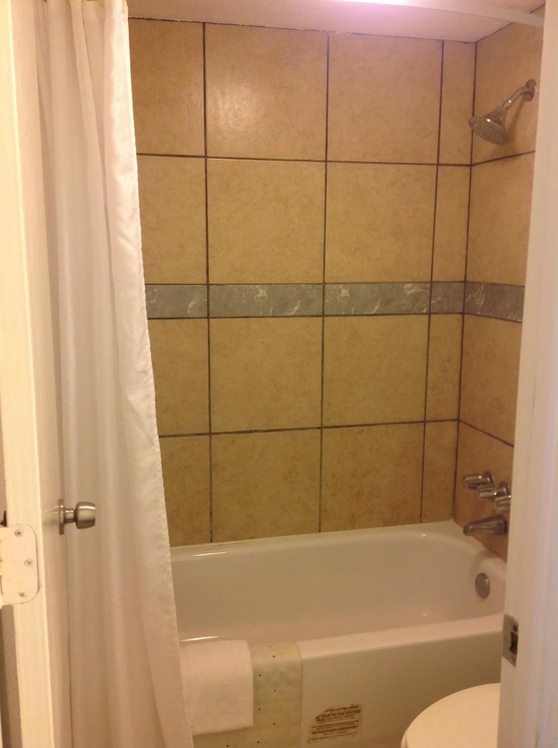 Bathroom in Houston Inn and Suites