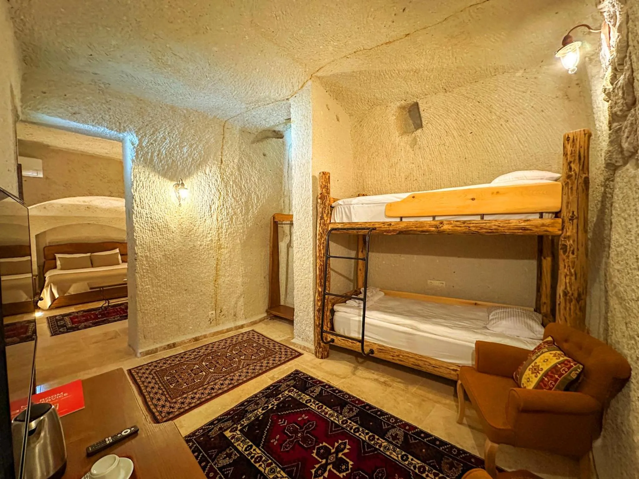 Living room, Bed in Tulip Cave Suites