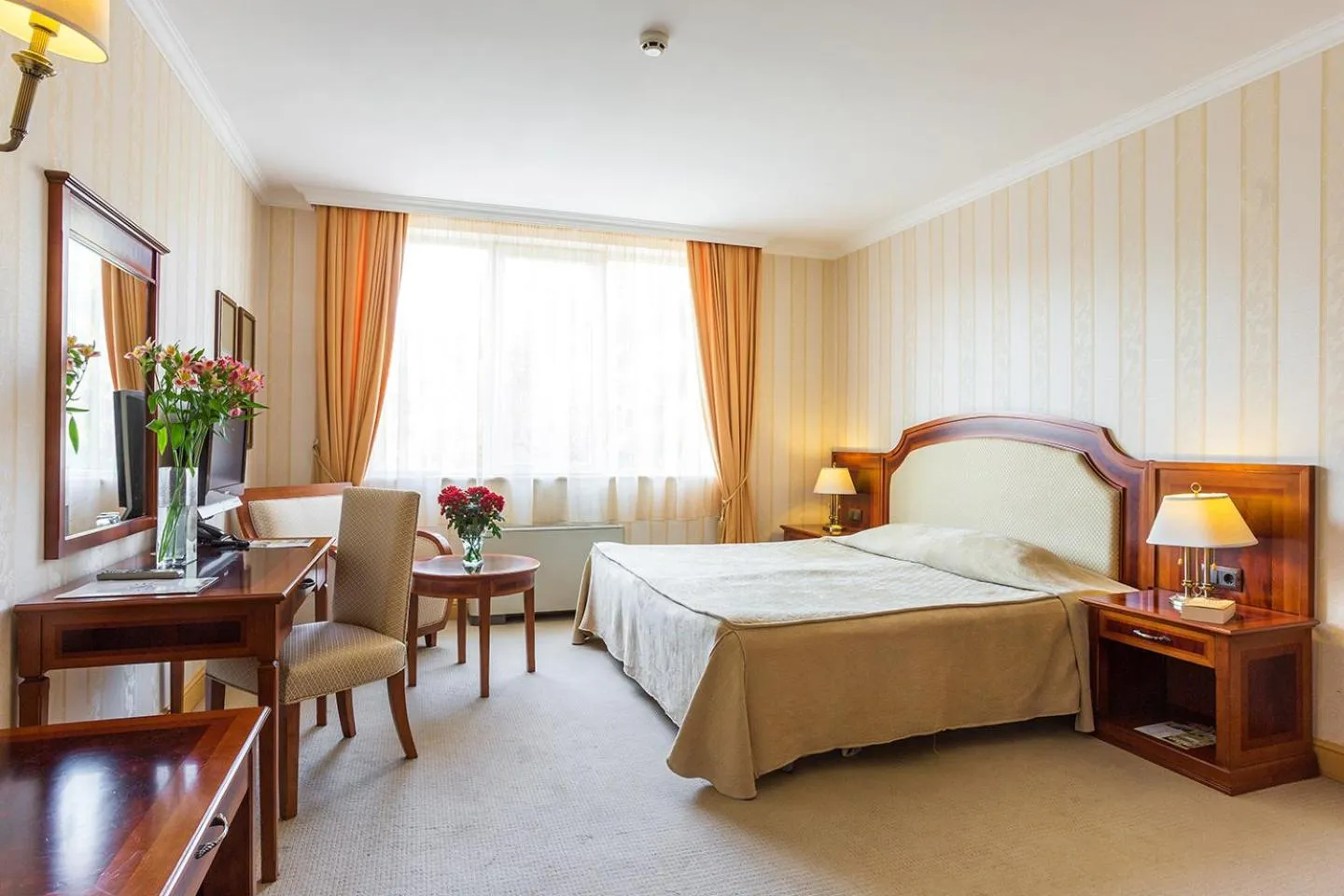 Bed in Romance Hotel and Family Suites