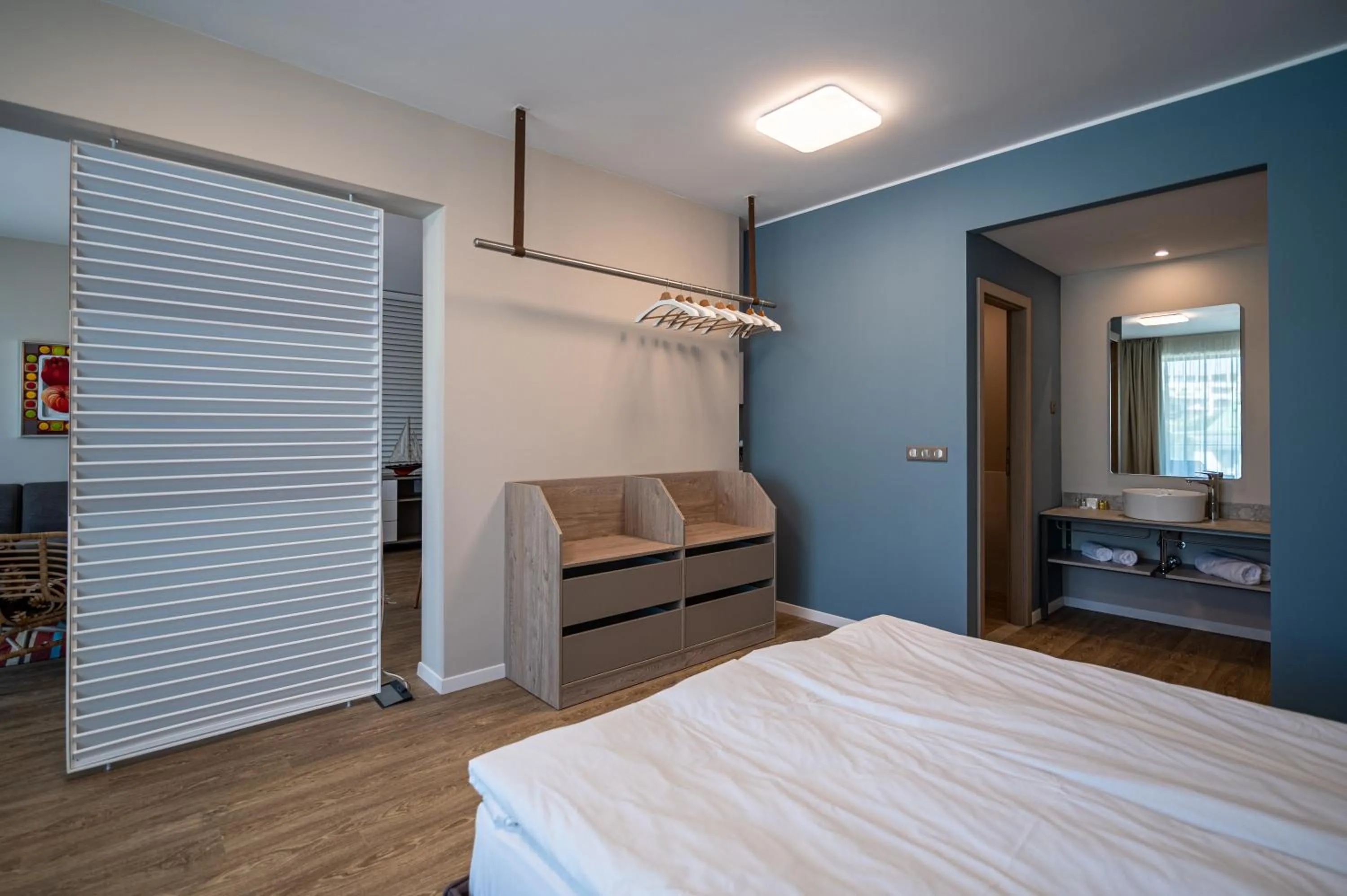 Bed in Romance Hotel and Family Suites