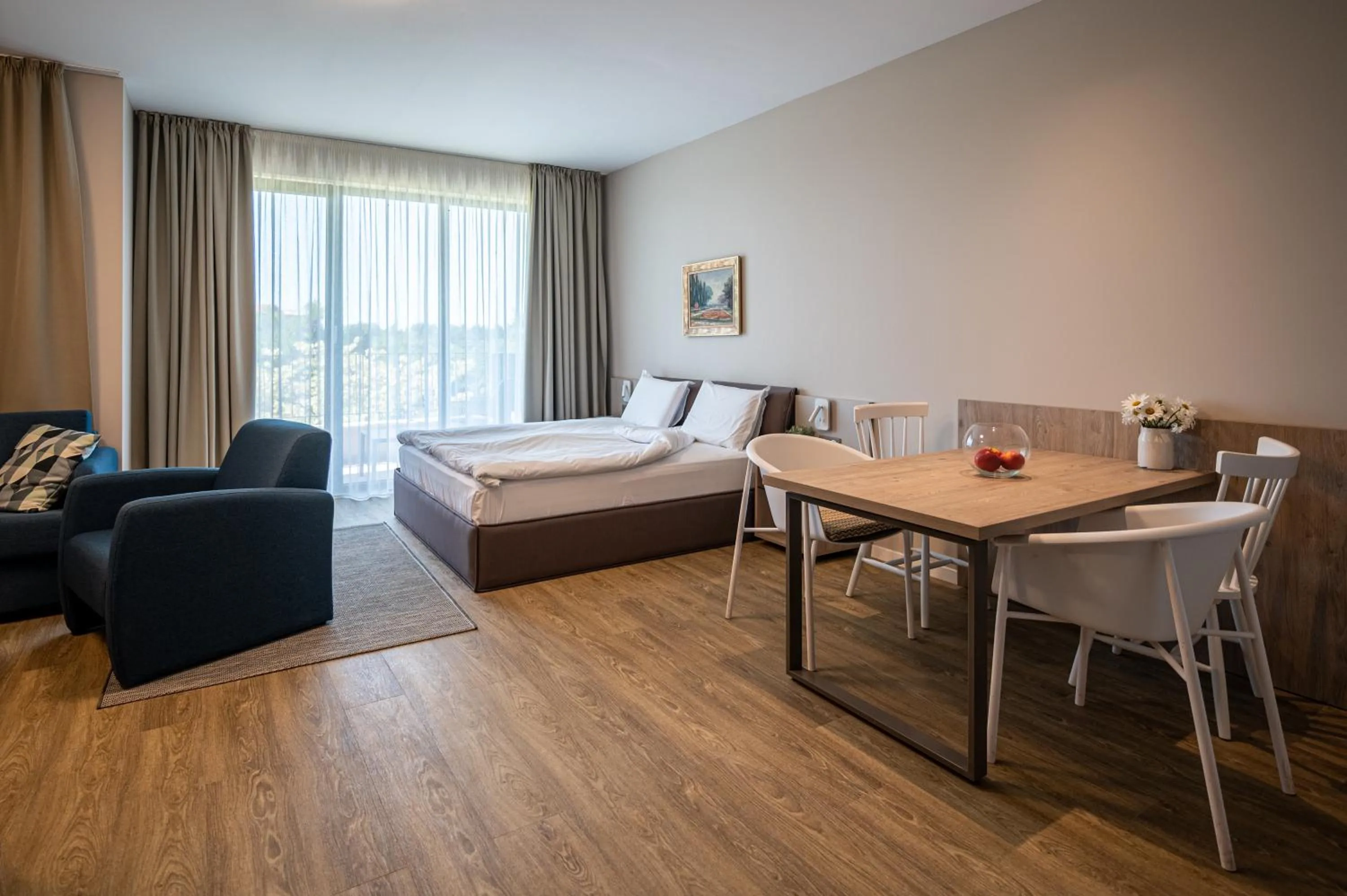 Bed in Romance Hotel and Family Suites