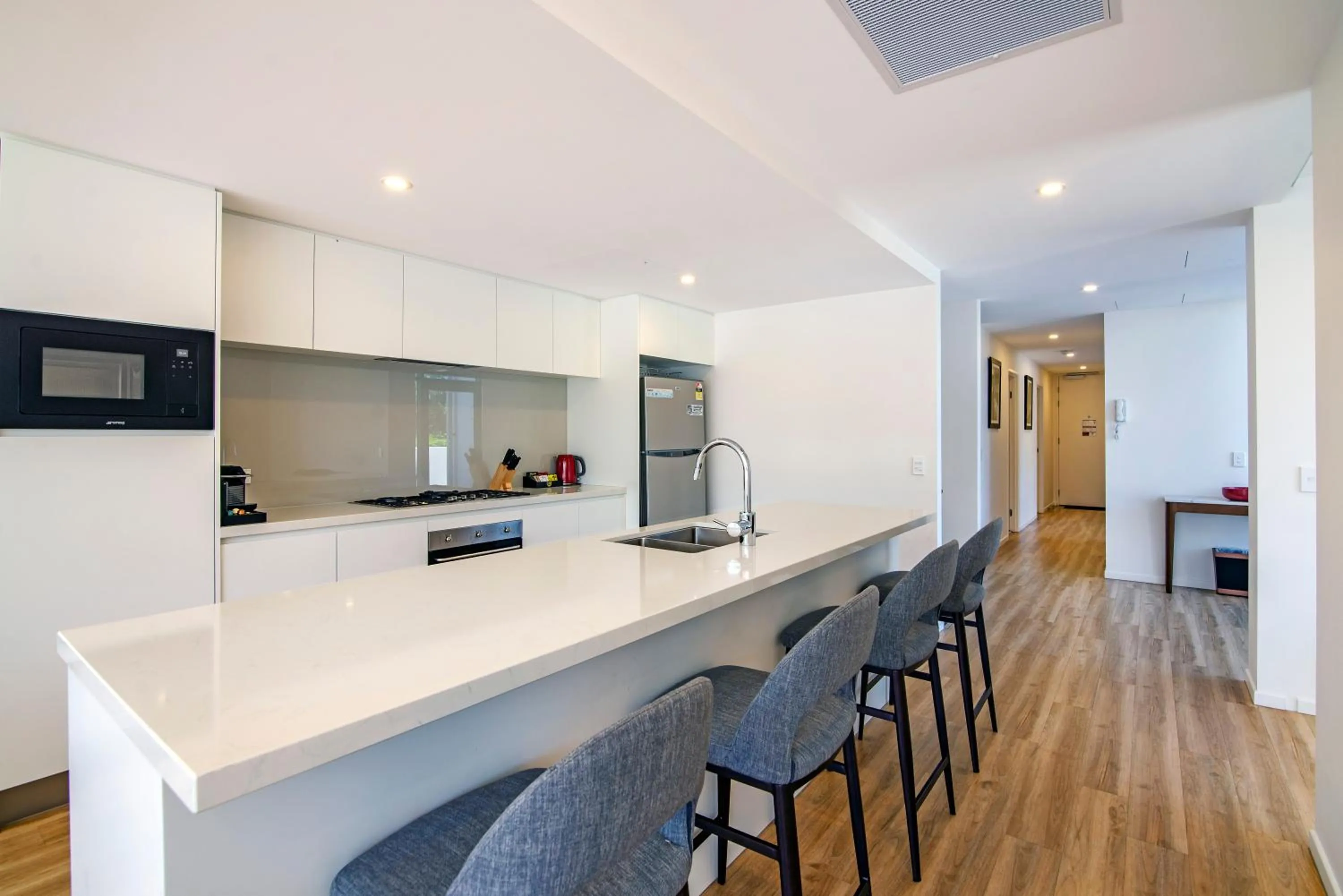 Kitchen or kitchenette in Ruby Gold Coast by CLLIX
