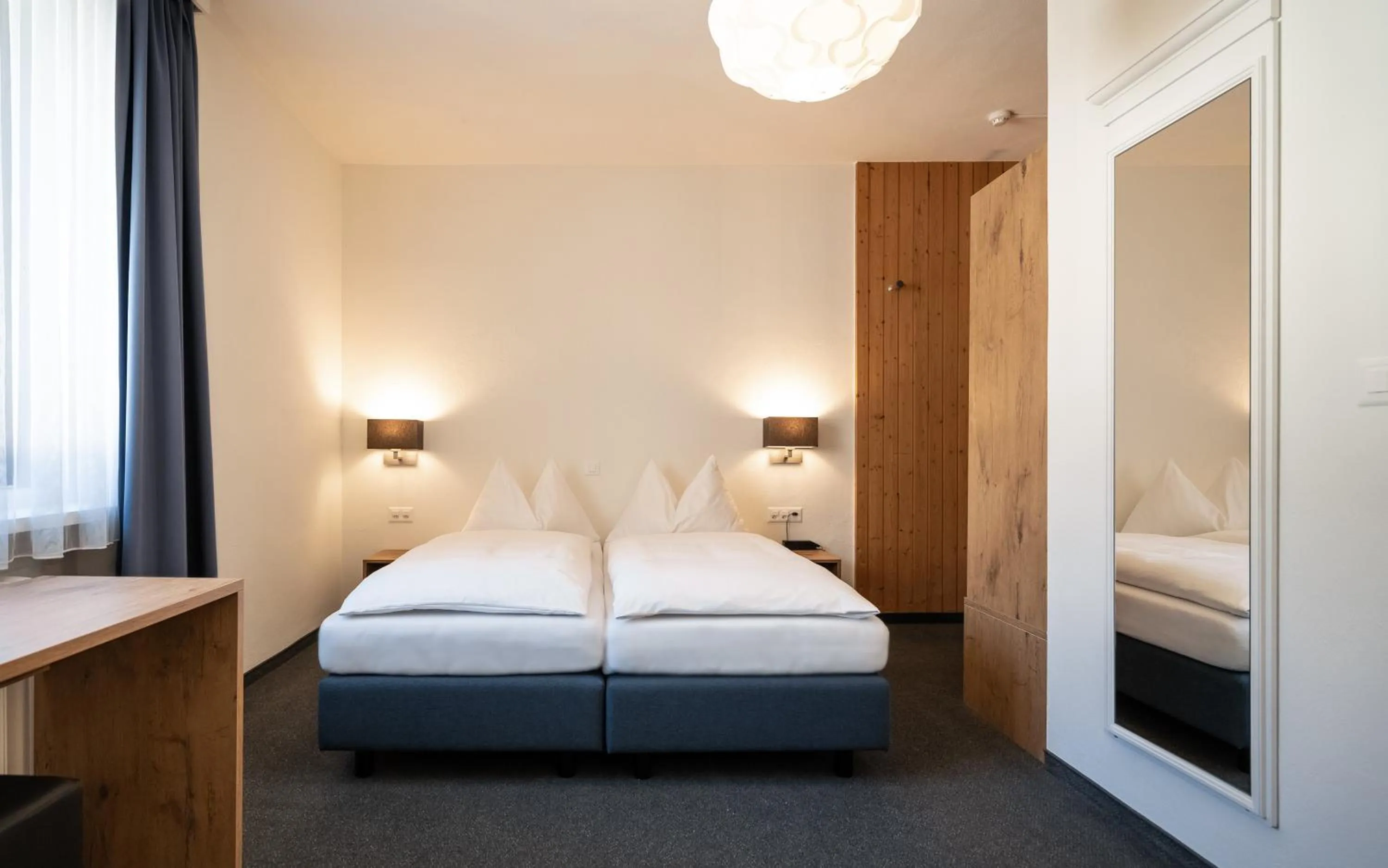 Photo of the whole room, Bed in Hotel Ochsen by Mountain Hotels