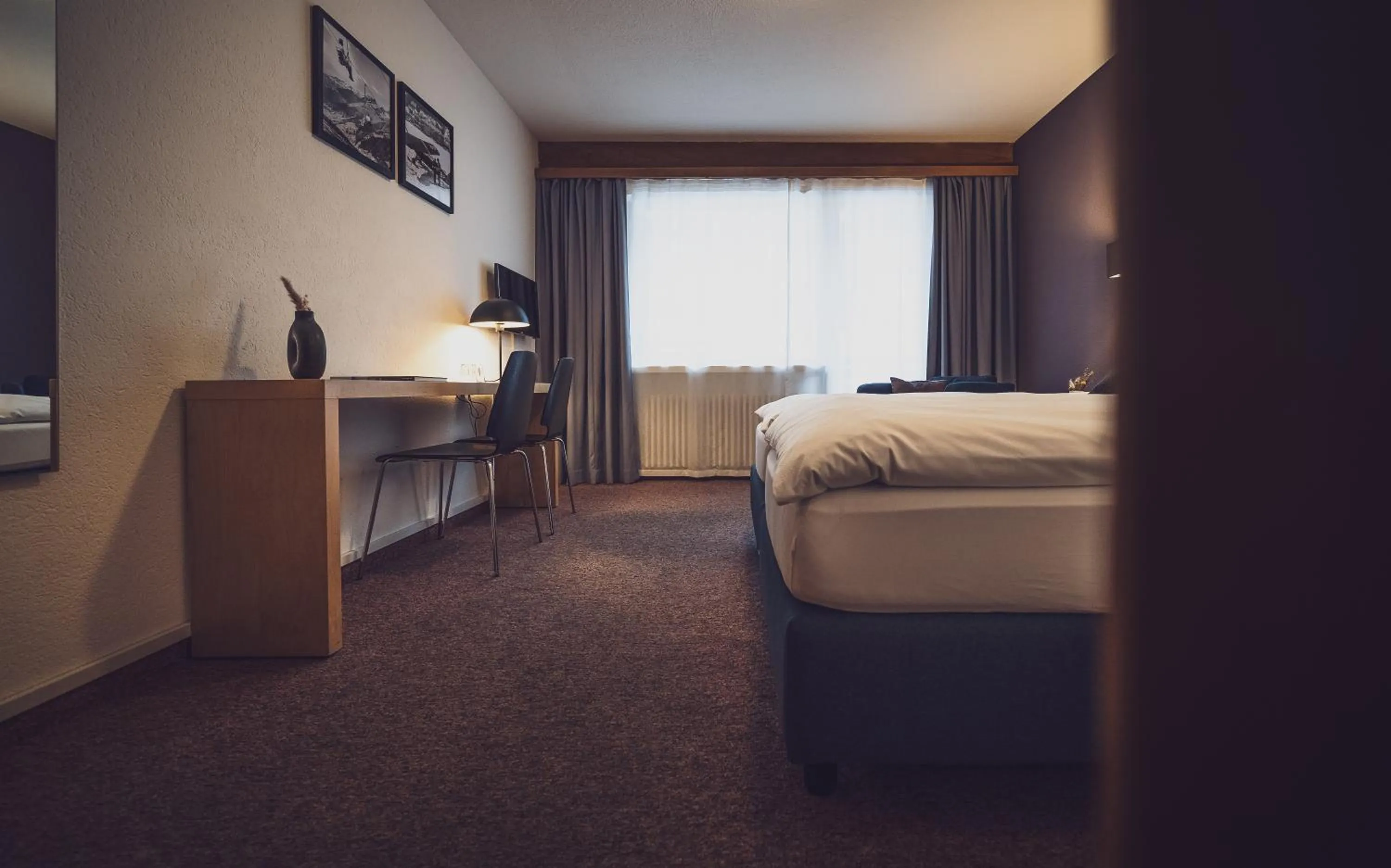 Photo of the whole room, Bed in Hotel Ochsen by Mountain Hotels