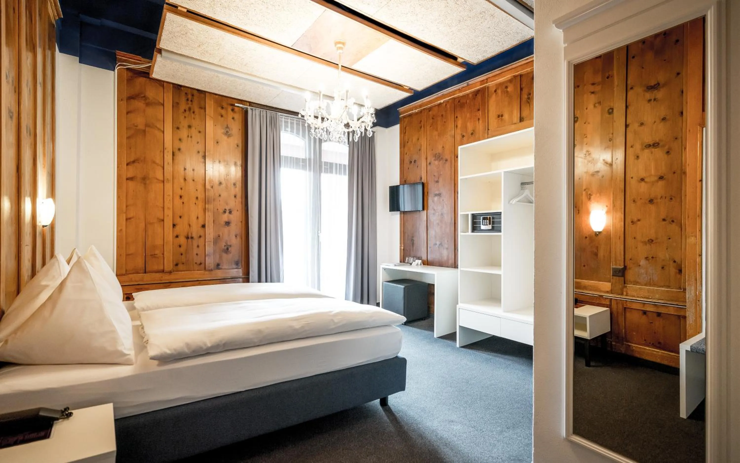 Photo of the whole room, Bed in Hotel Ochsen by Mountain Hotels