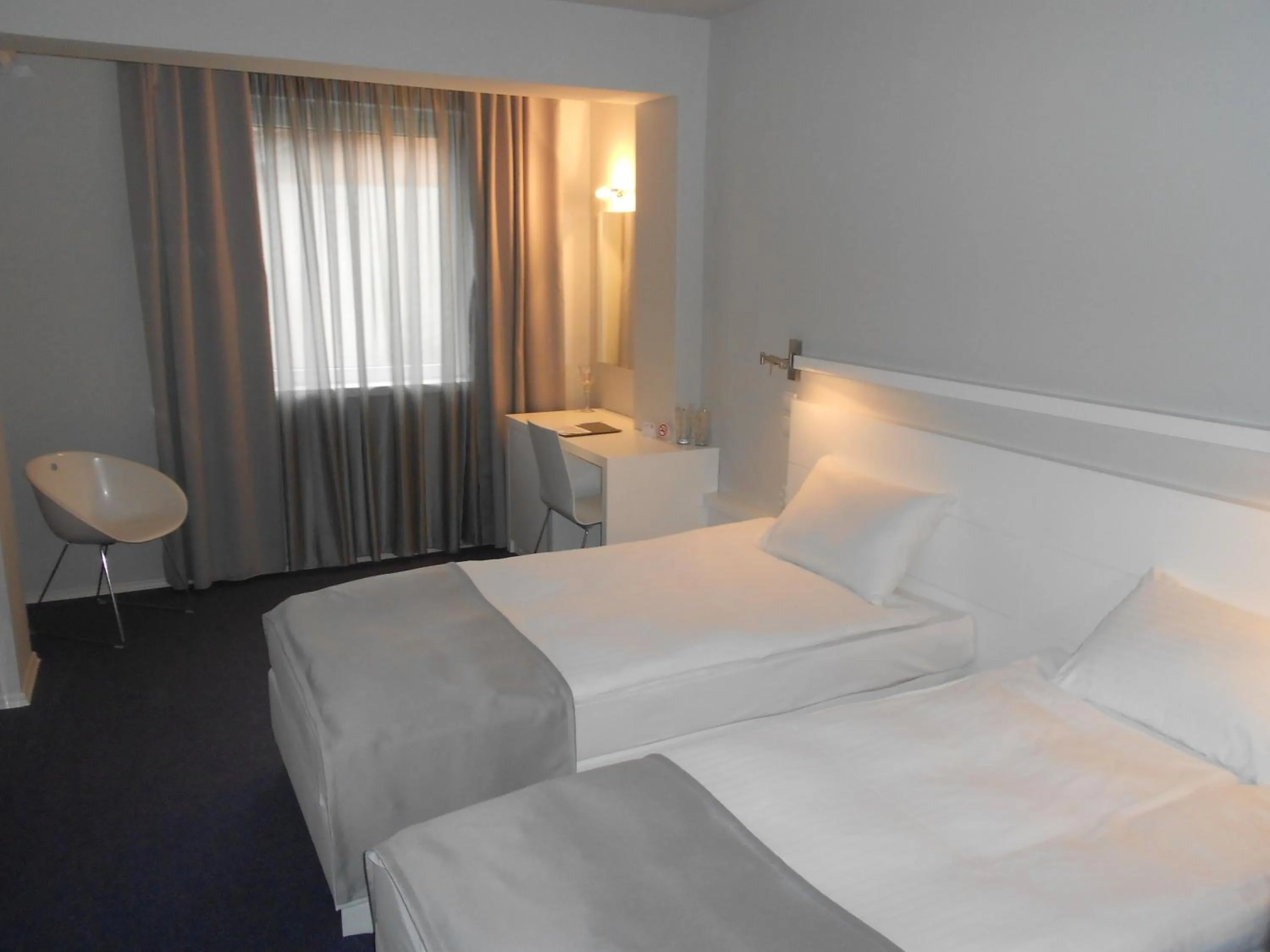 Bed in Leonardo Hotel