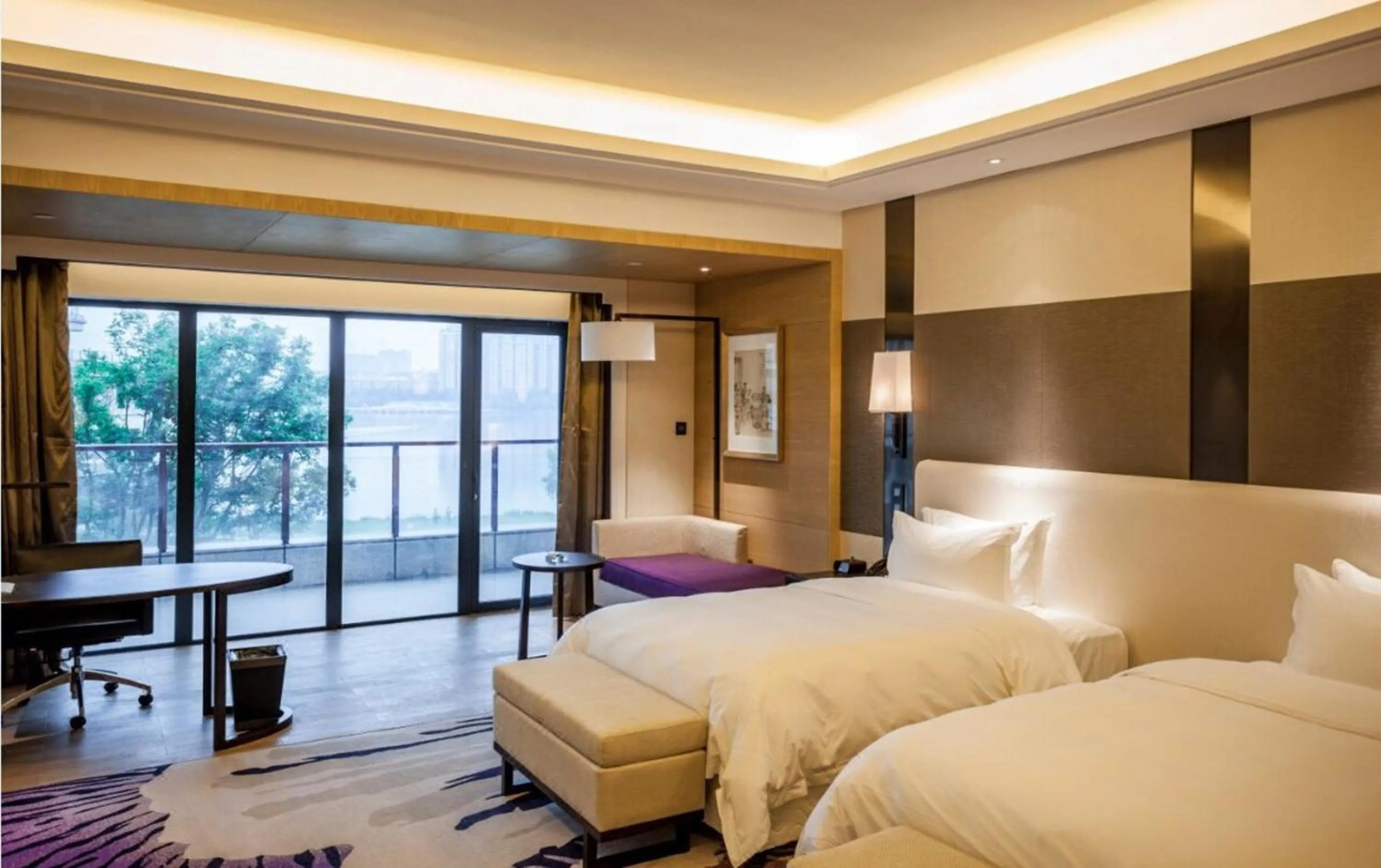 Bed in Radisson Blu Hotel Wuhan ETD Zone