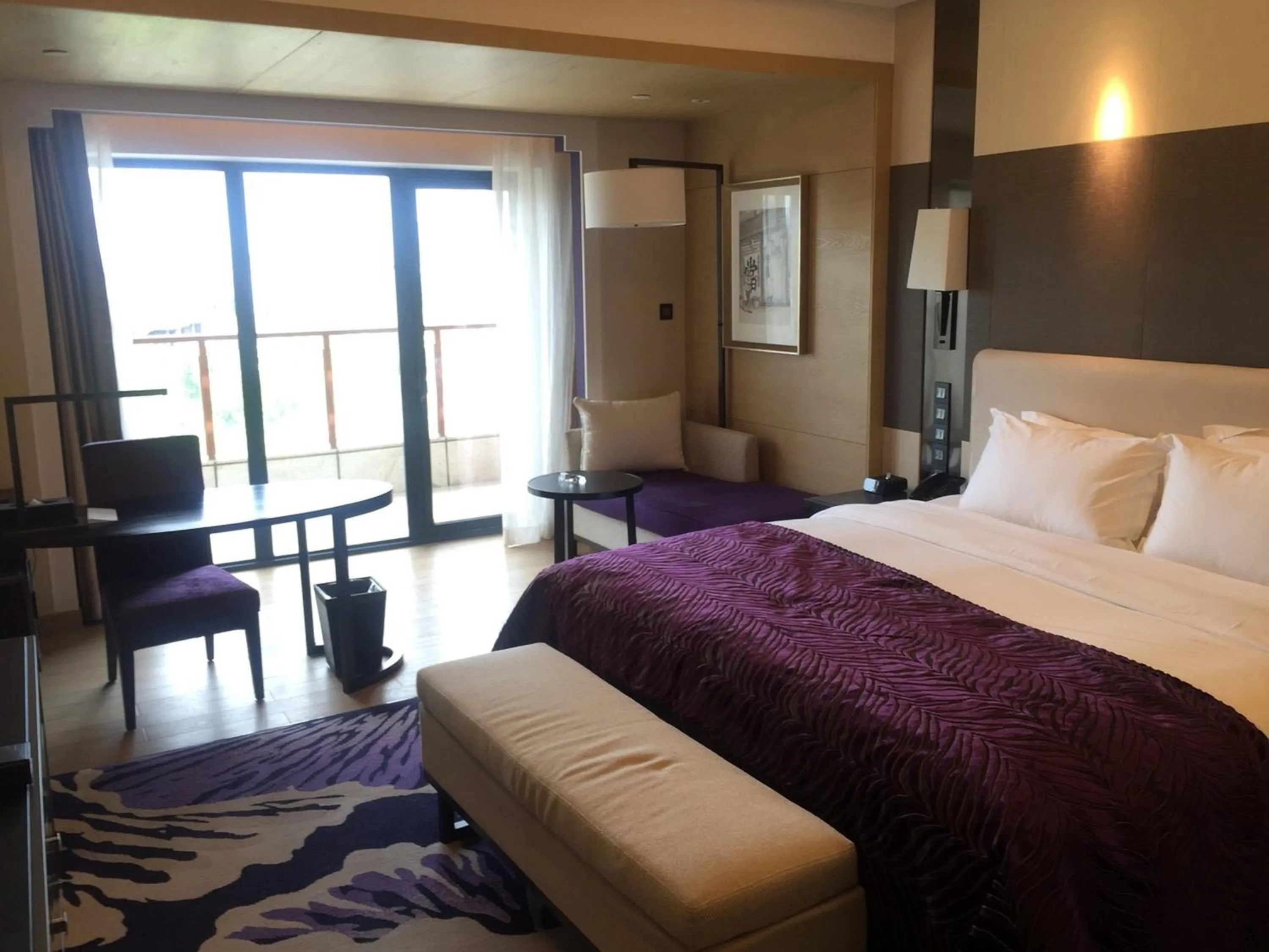 Bed in Radisson Blu Hotel Wuhan ETD Zone