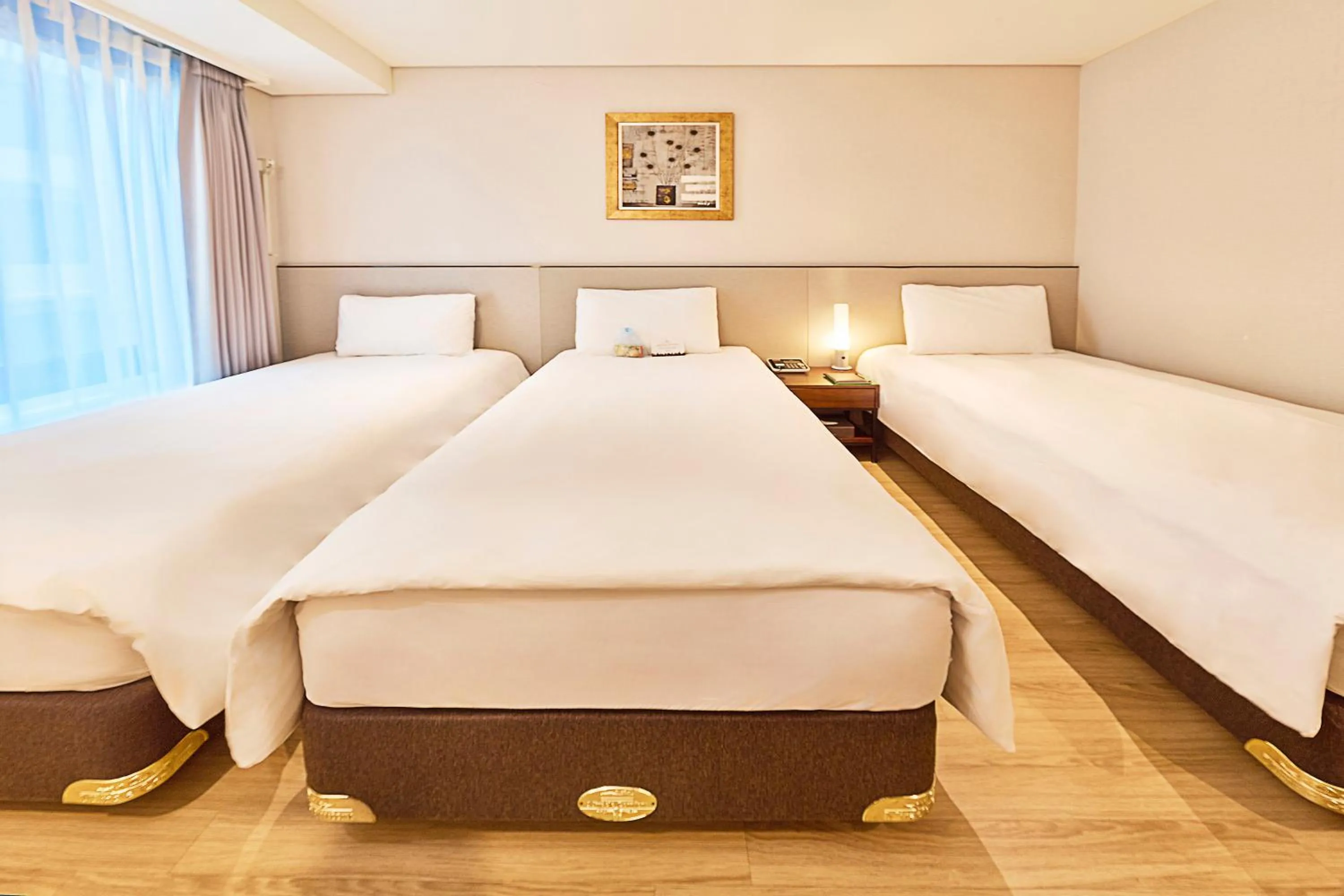 Bed in Hotel Thomas Myeongdong