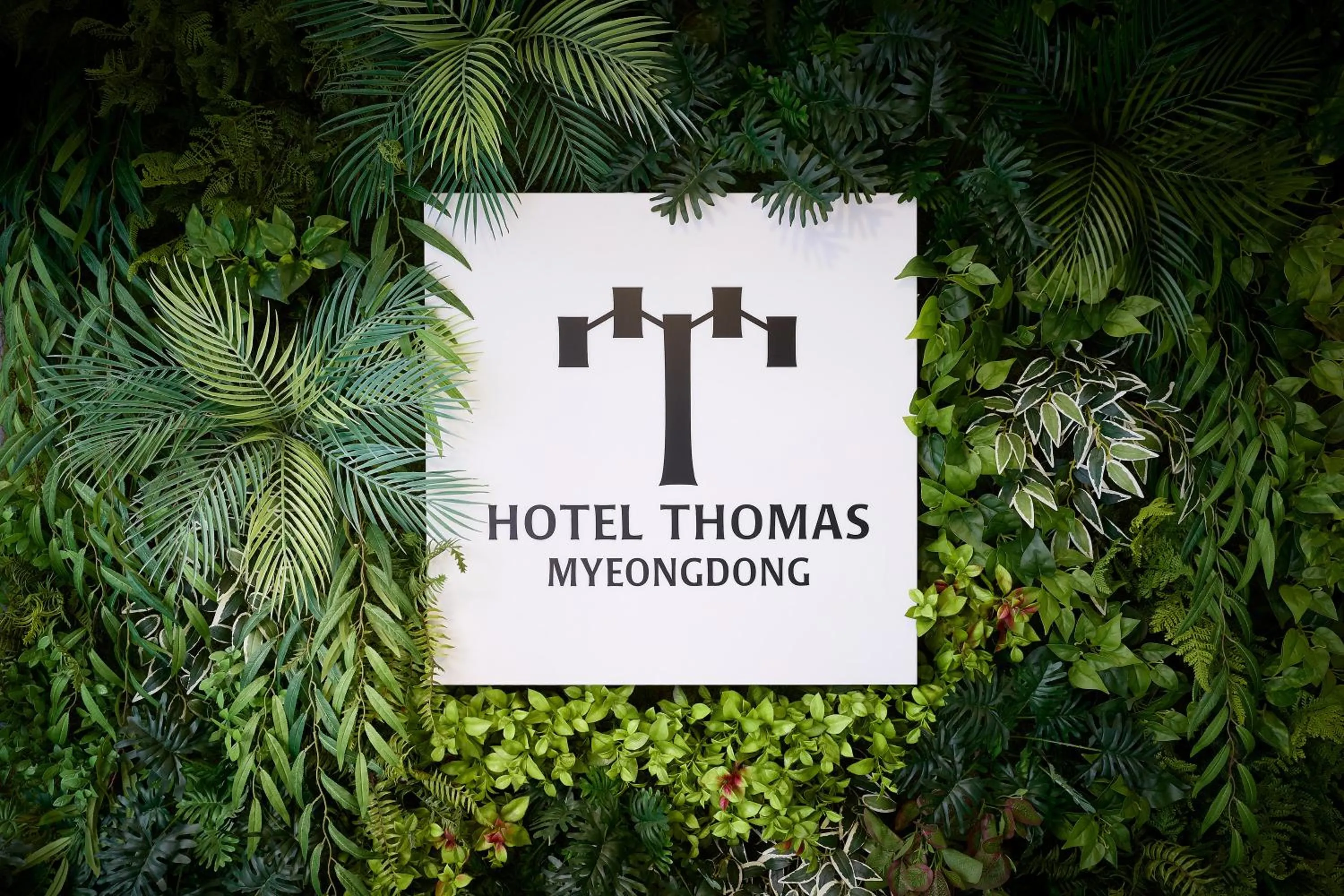 Property logo or sign in Hotel Thomas Myeongdong