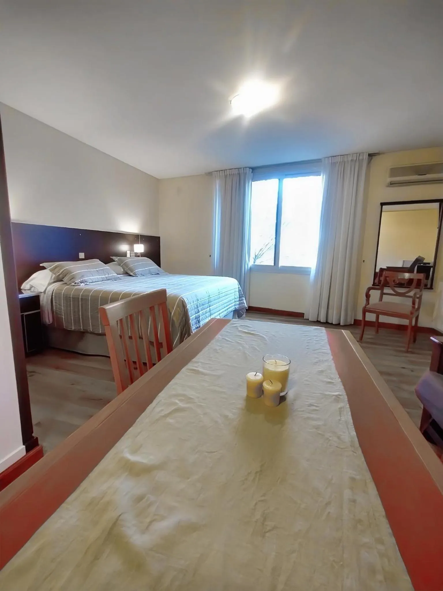 Bed in Cóndor Suites Apart Hotel