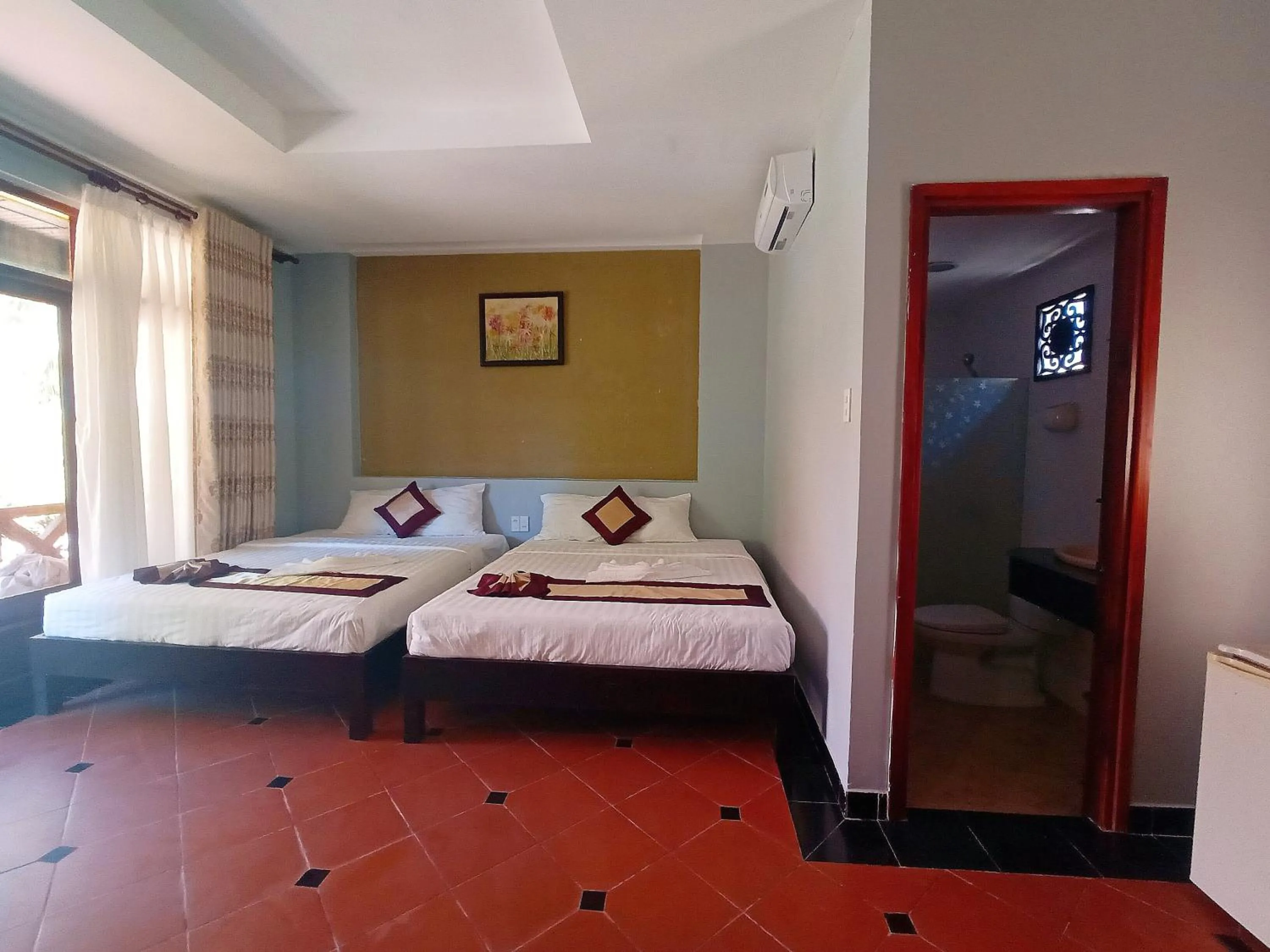 Bed in Thai Hoa Mui Ne Resort