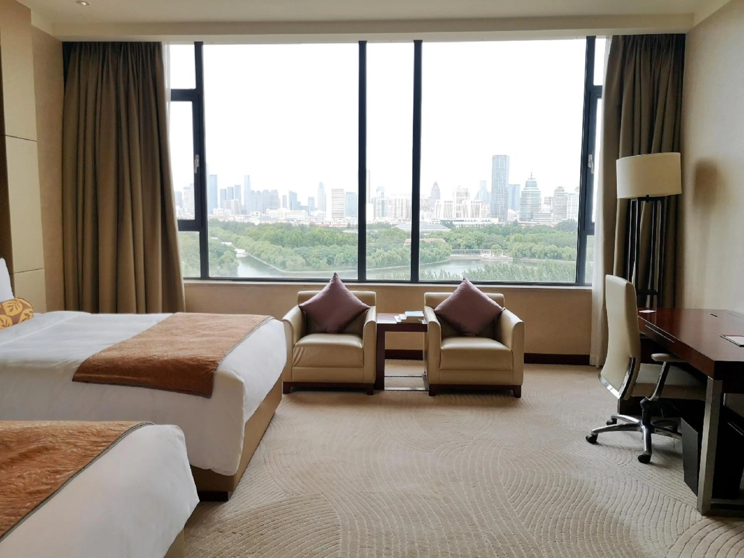 On site, Bed in Renaissance Tianjin Lakeview Hotel