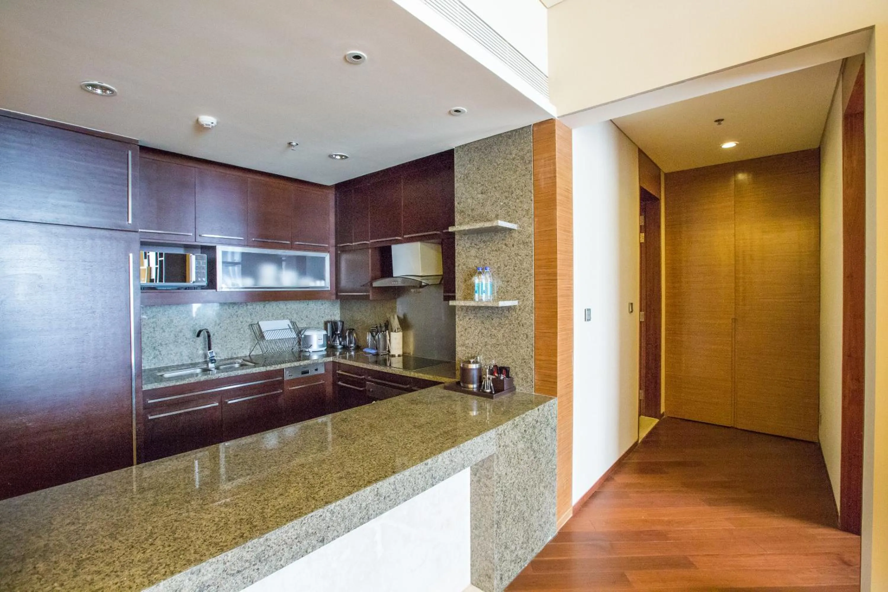 Kitchen or kitchenette in Marriott Executive Apartment Tianjin Lakeview