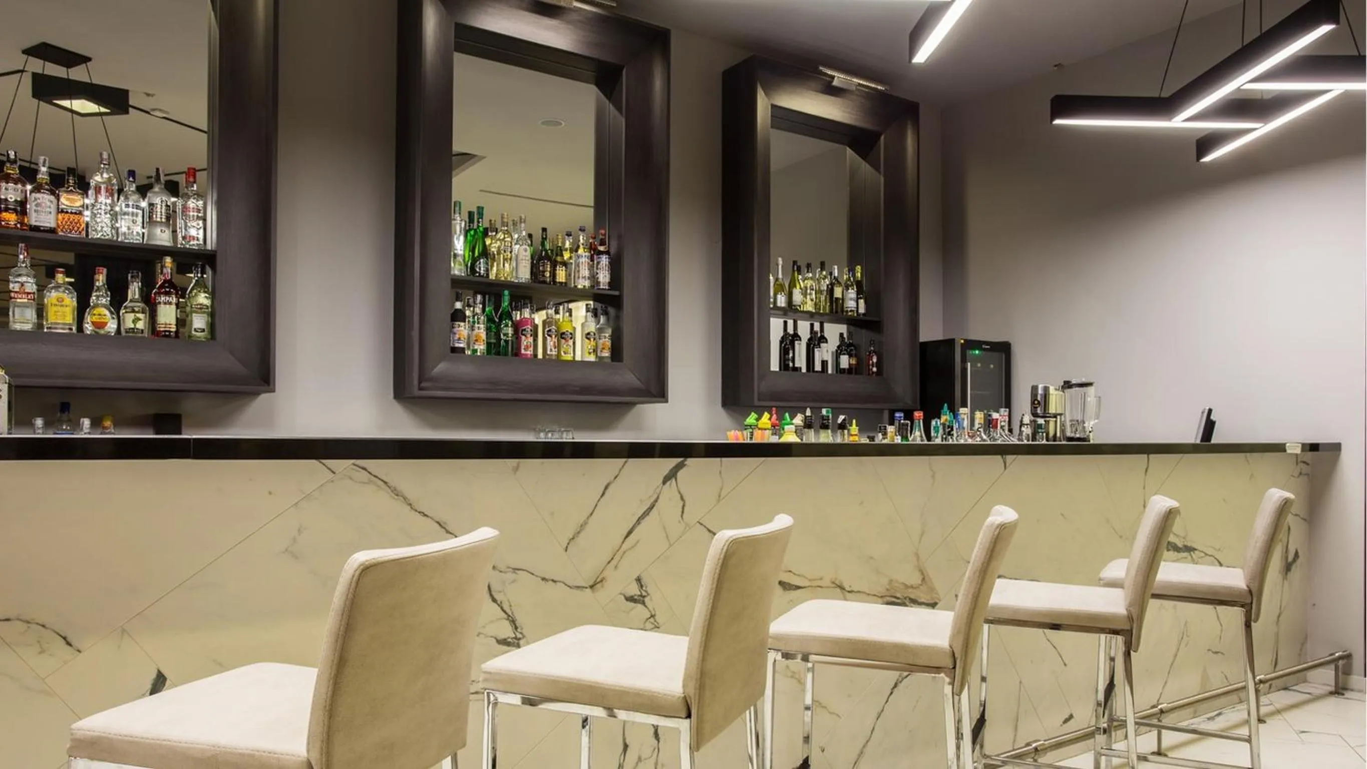 Lounge or bar in Astera Hotel & Spa with FREE PRIVATE BEACH