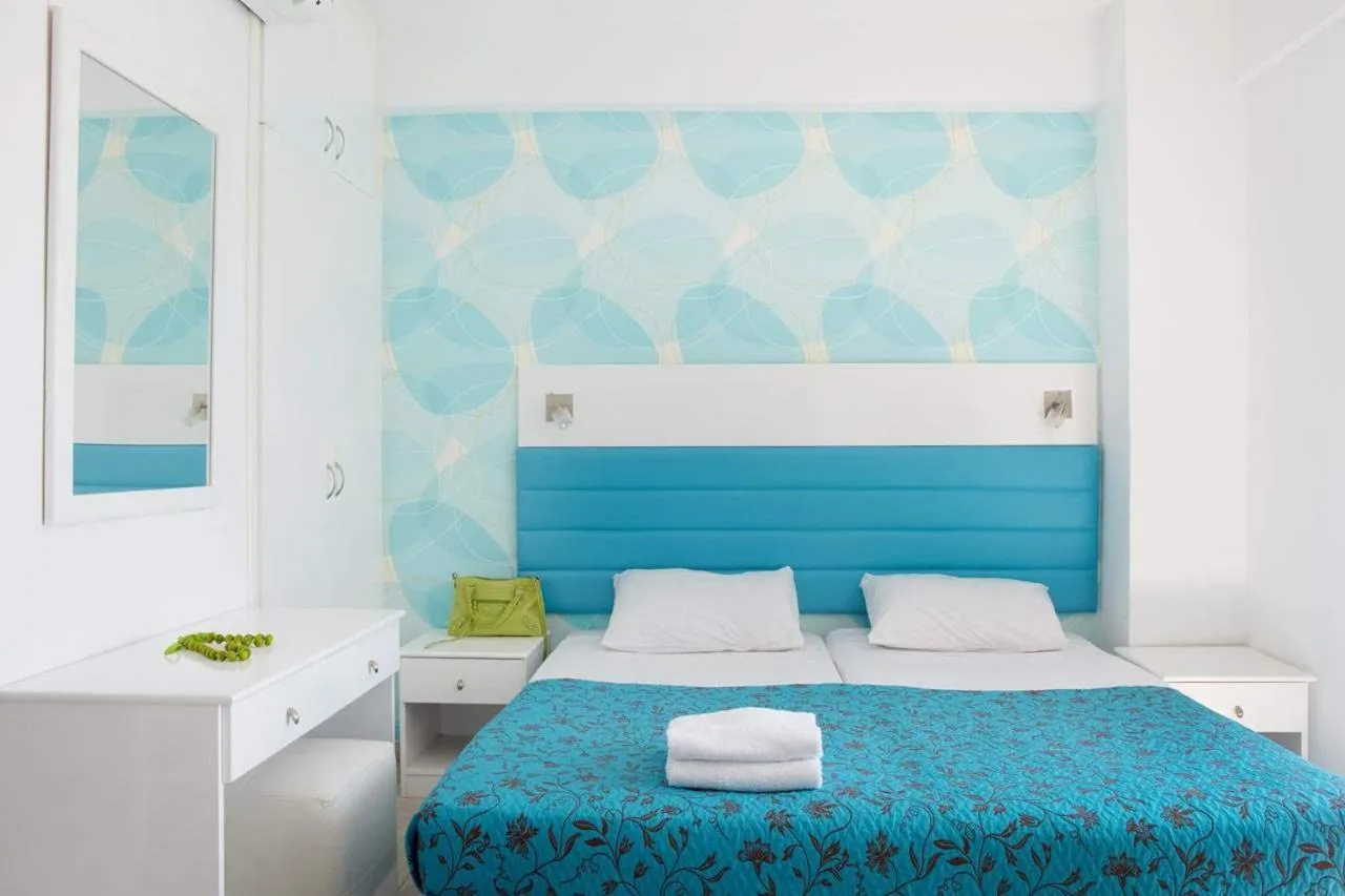 Bed in Lantiana Gardens ApartHotel