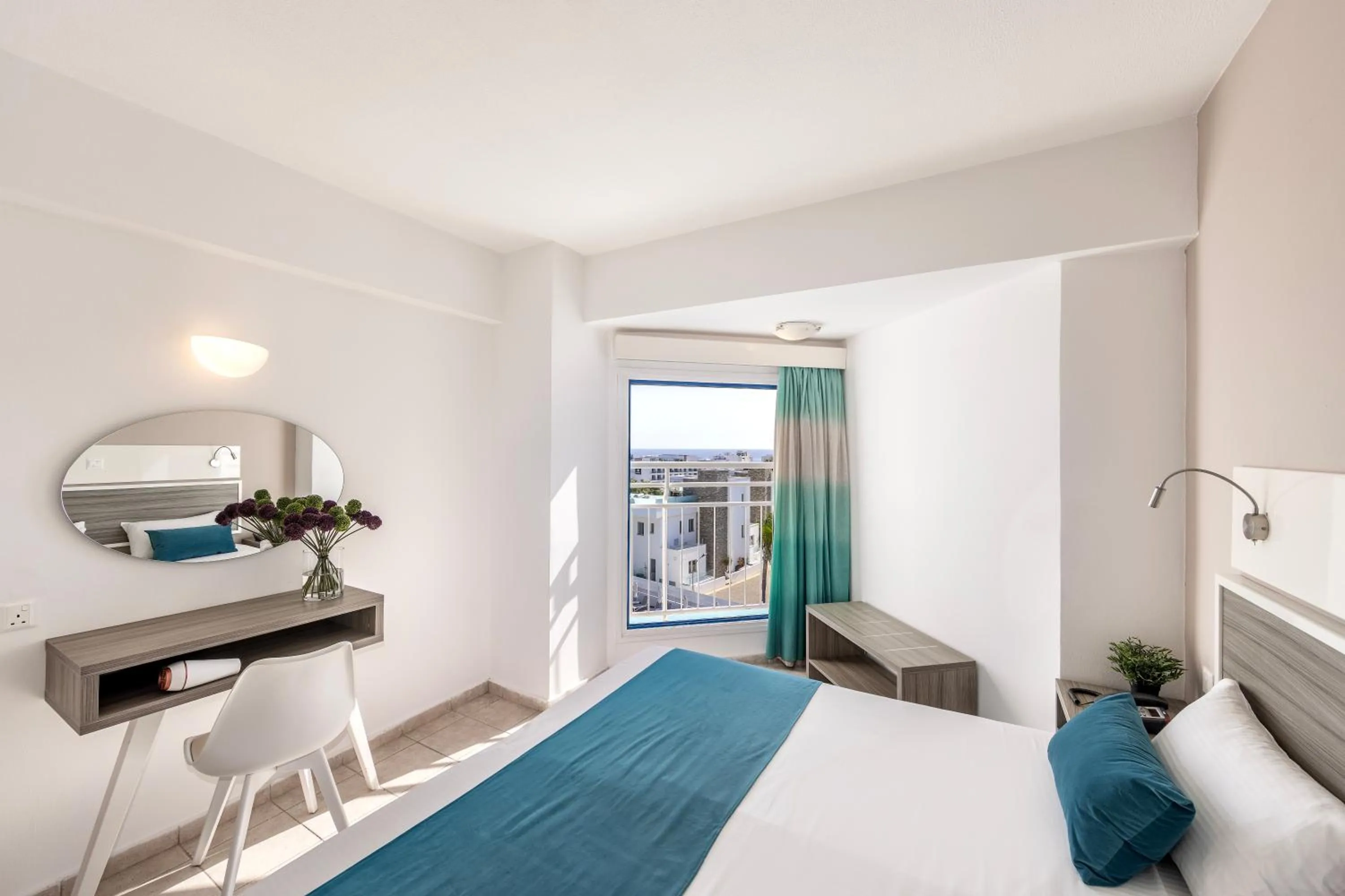 Bed in Lantiana Gardens ApartHotel