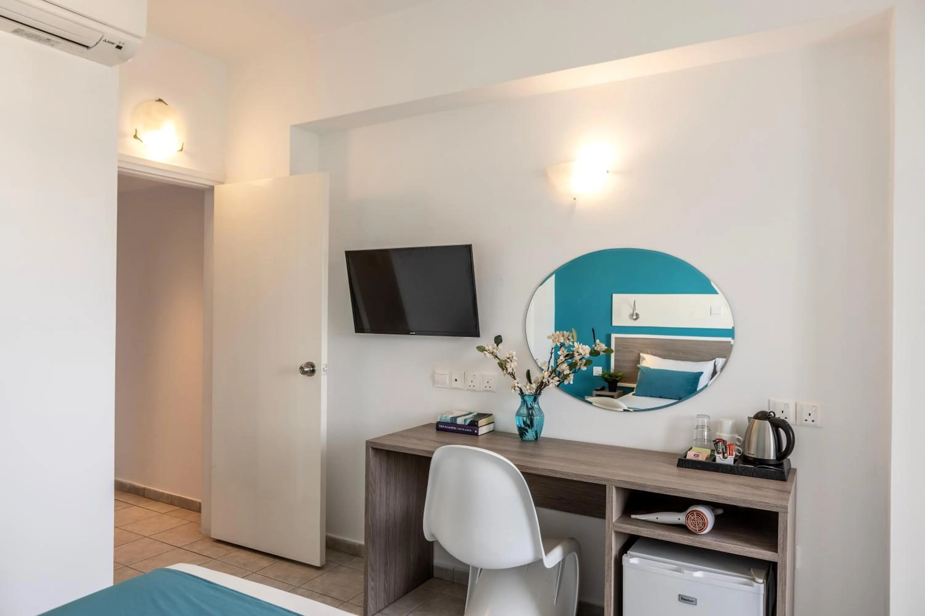 Bed in Lantiana Gardens ApartHotel