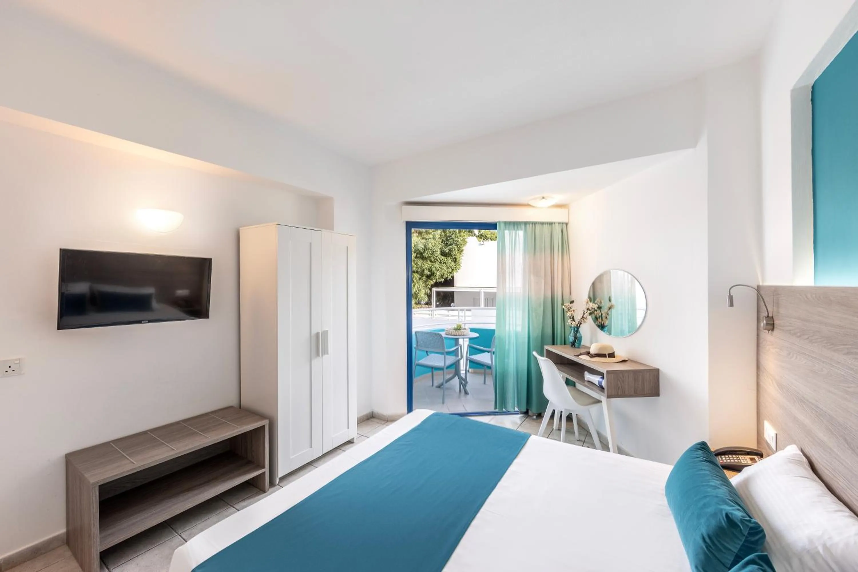 Bed in Lantiana Gardens ApartHotel