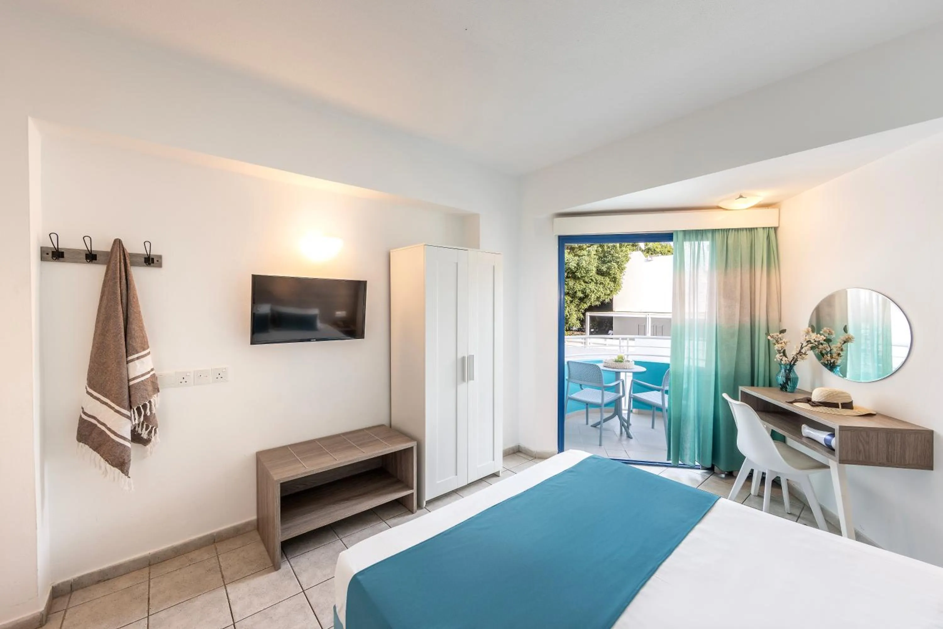 Bed in Lantiana Gardens ApartHotel