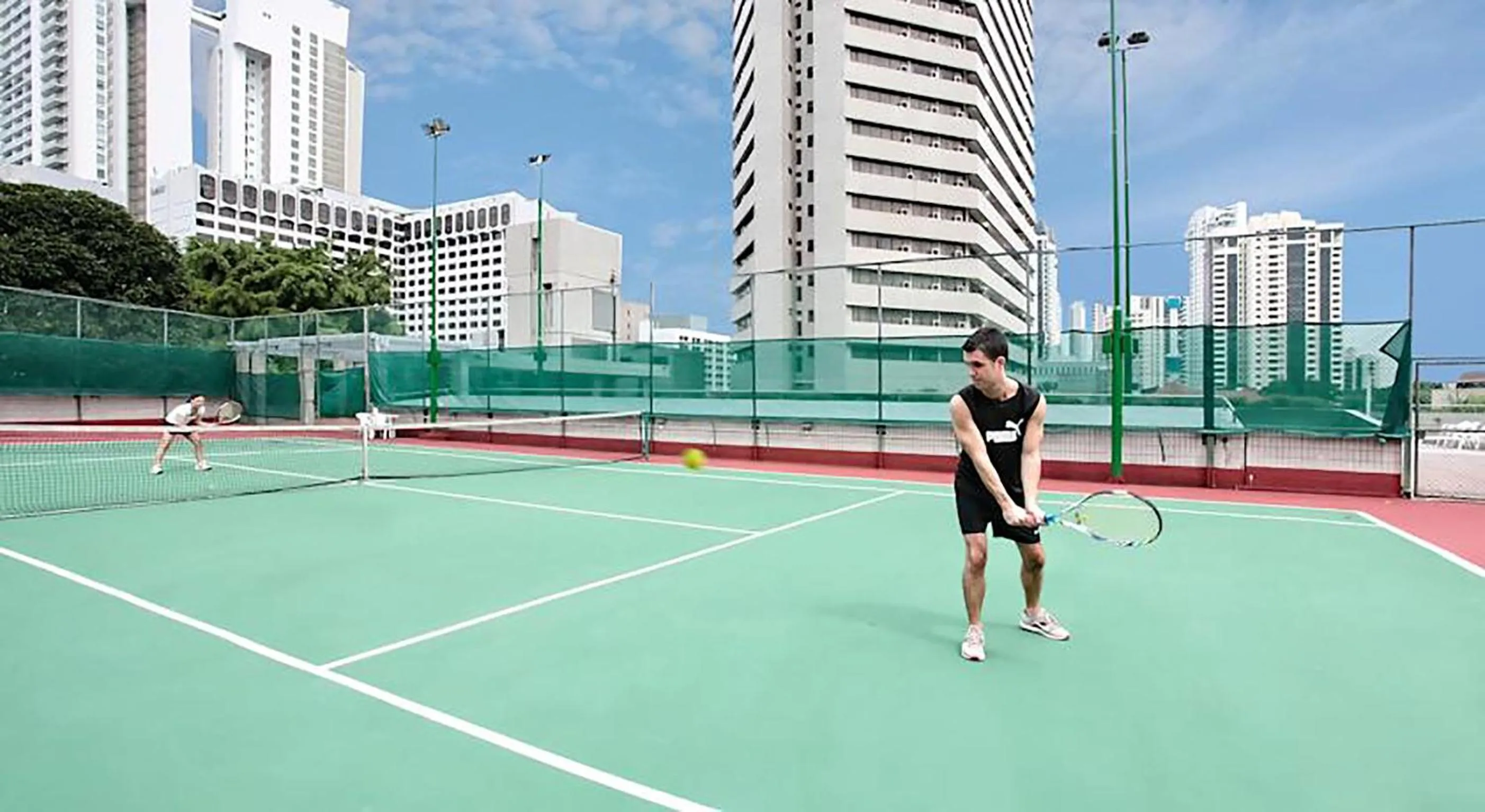 Tennis court in Far East Plaza Residences by Far East Hospitality
