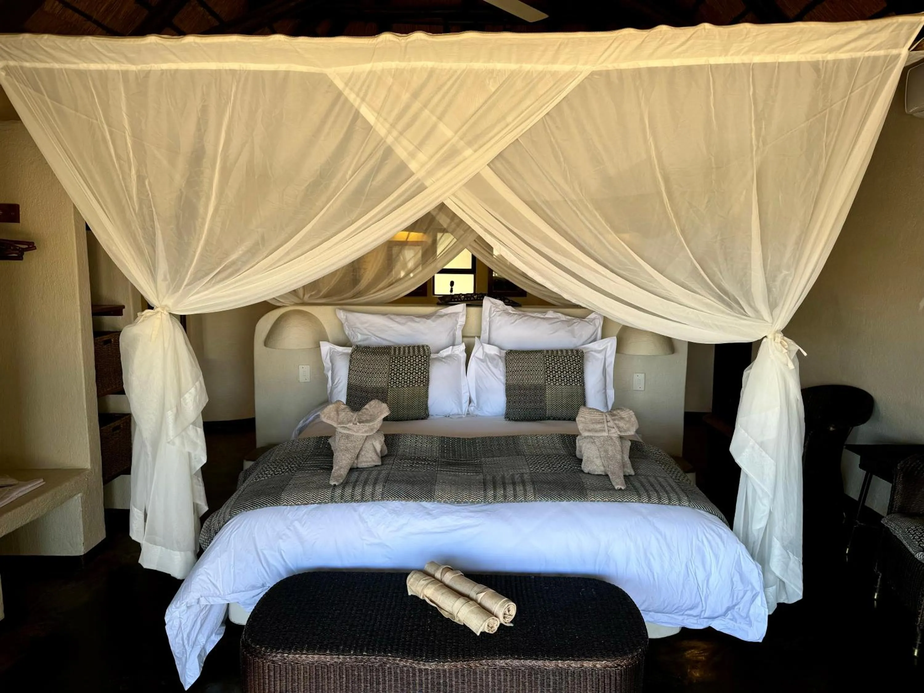 Bed in Nyati Safari Lodge