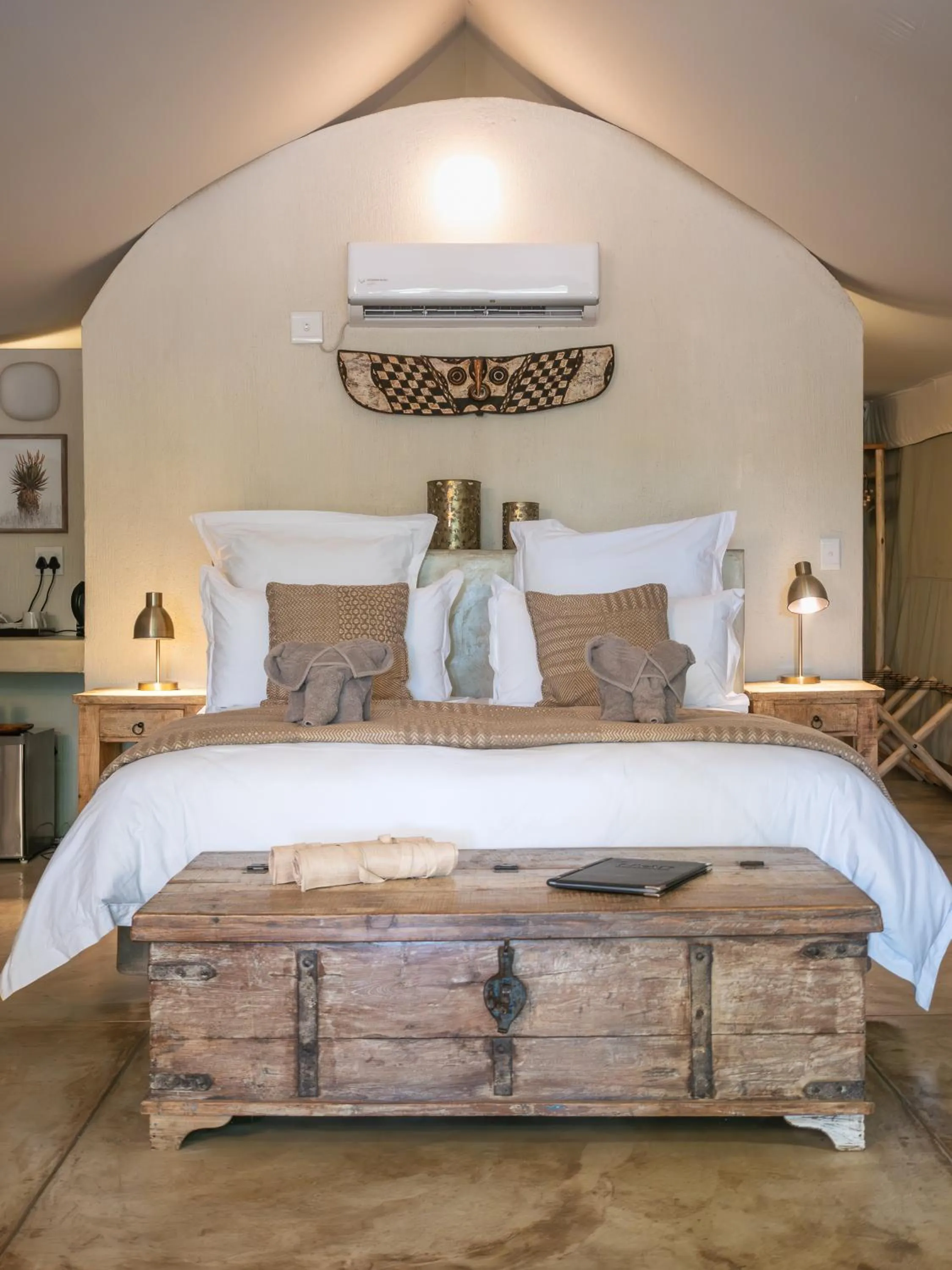 Bed in Nyati Safari Lodge